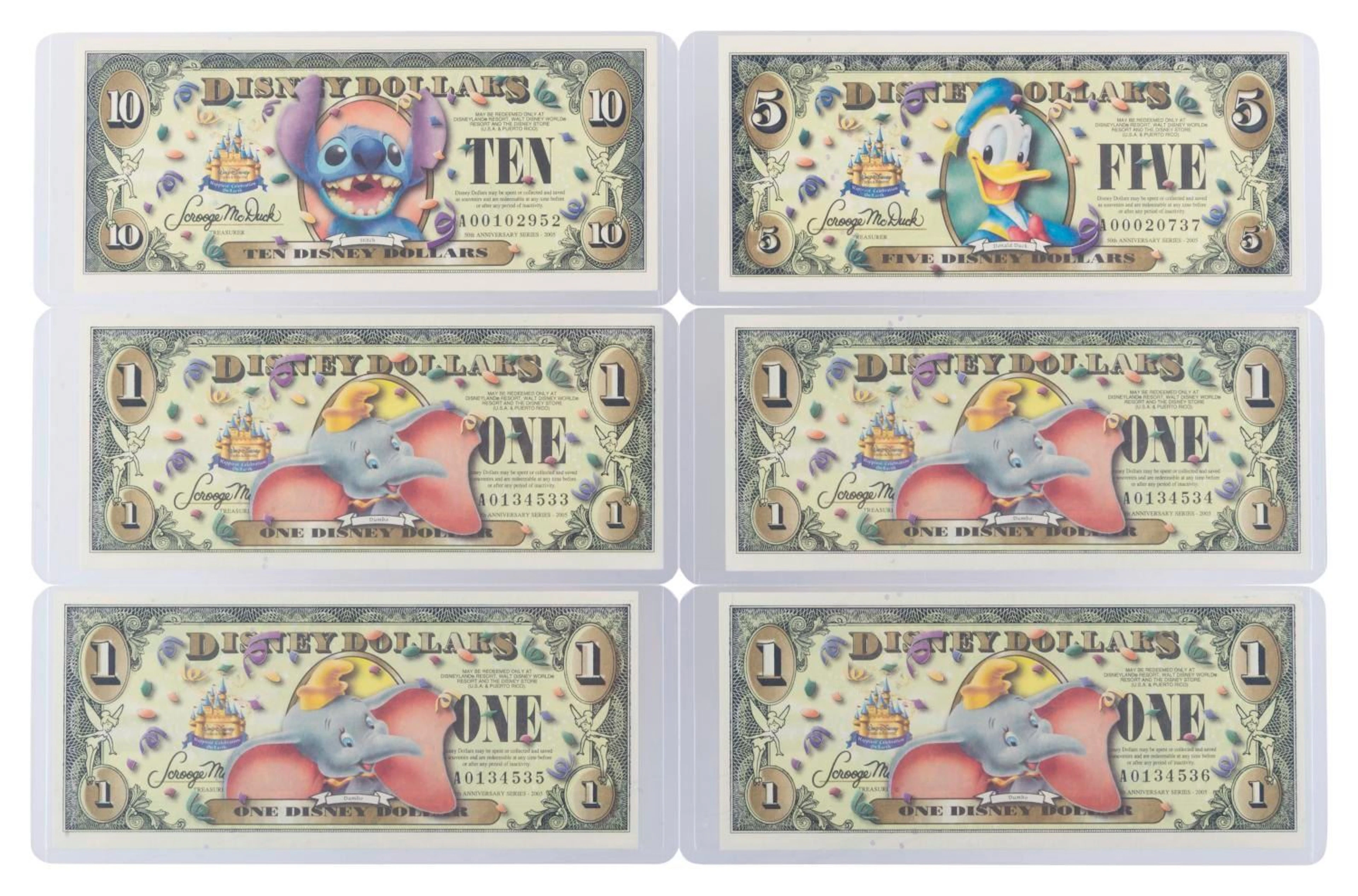 The Disneyland 2005 A First Series $1, $5, and $10 Bills.