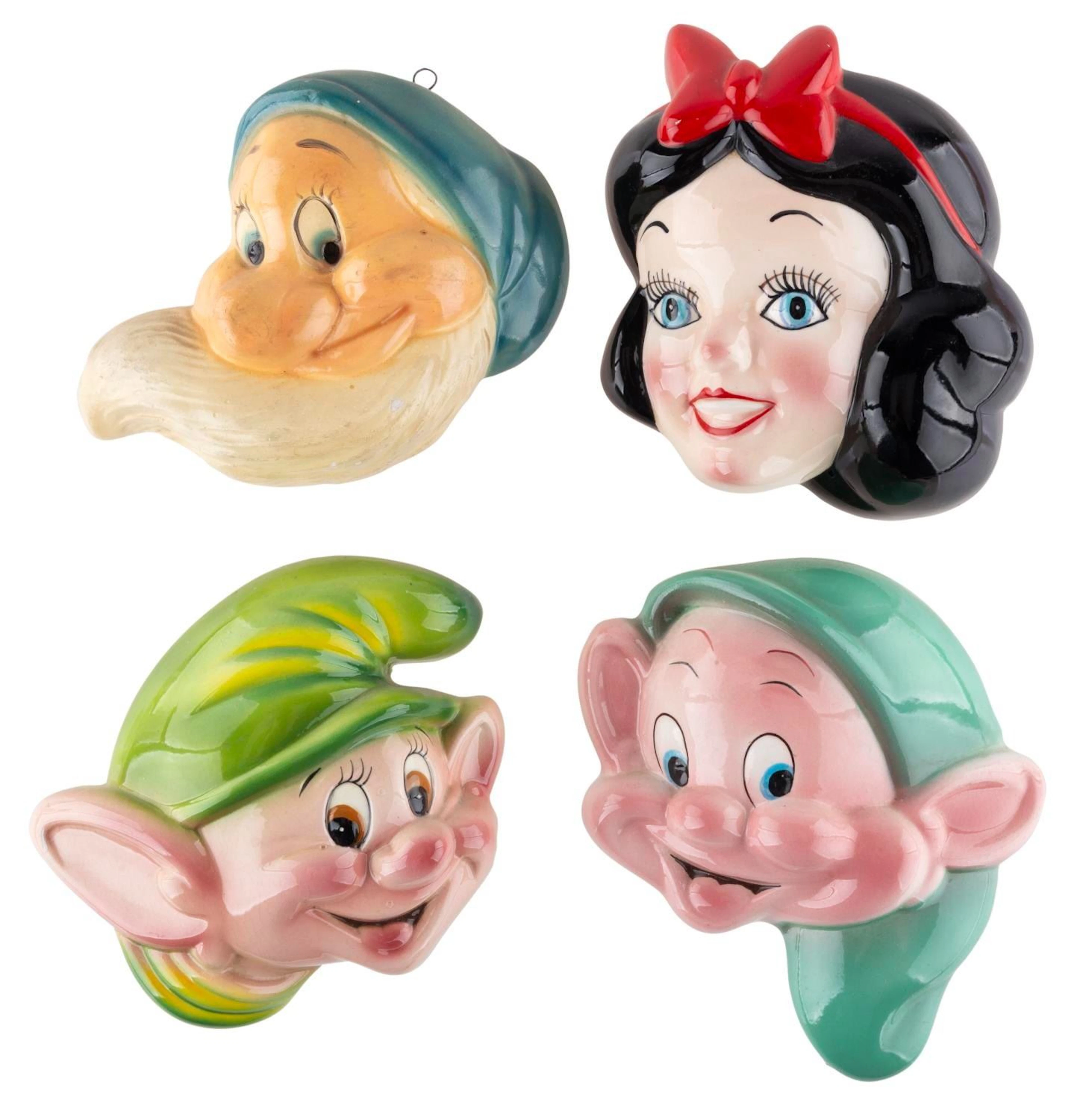 A Collection of "Snow White and the Seven Dwarfs" Wall Plaque.