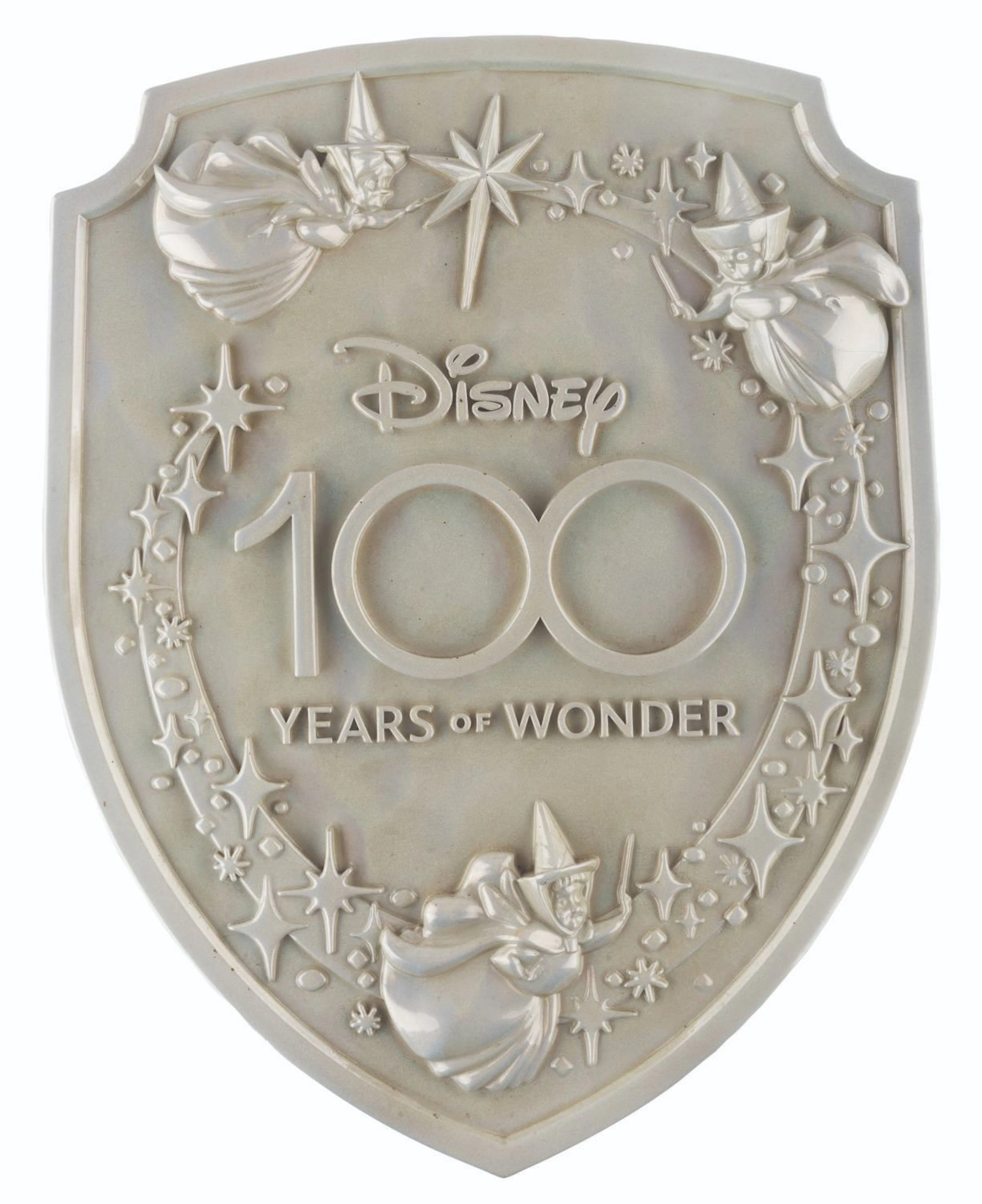 A Disneyland "Disney 100 Years of Wonder" Lamppost Shield.