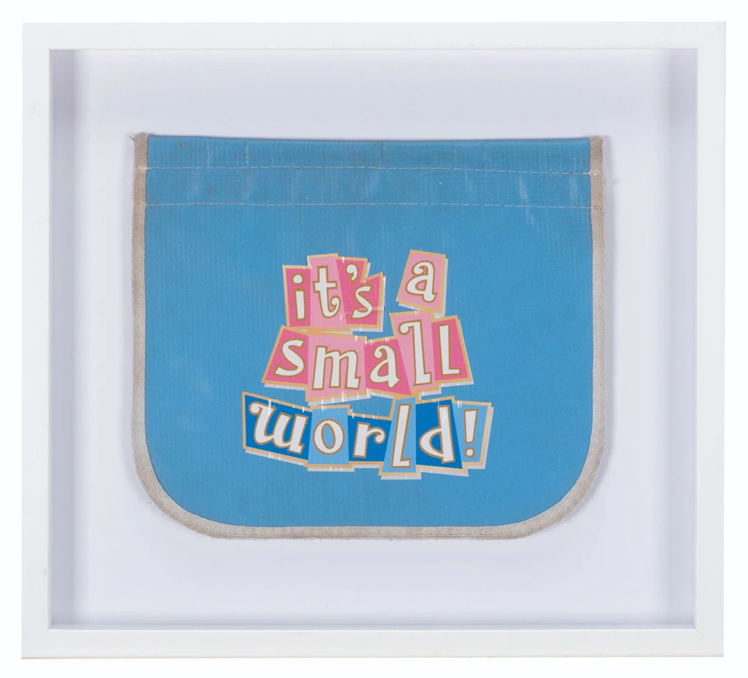 An It's A Small World Crowd Control Flag.