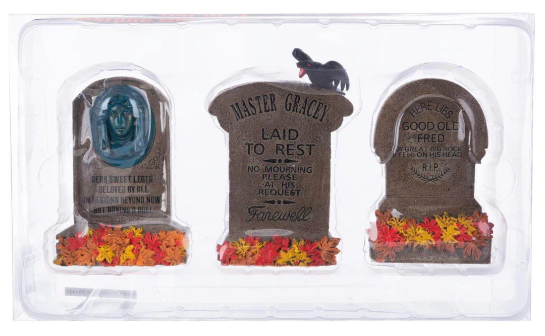 A Haunted Mansion Tombstone Figure Set.