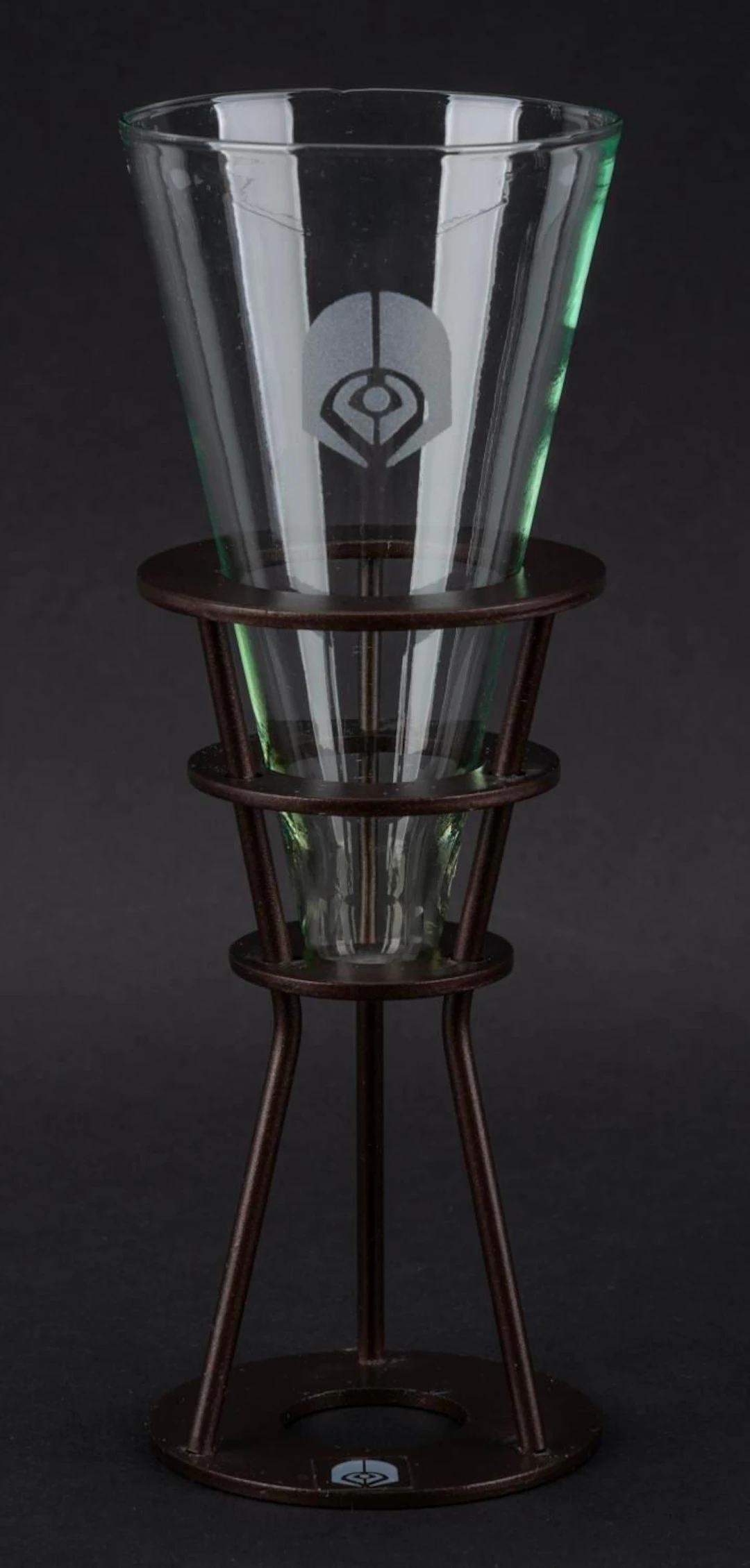 A Quark's Souvenir Shot Glass and Holder.