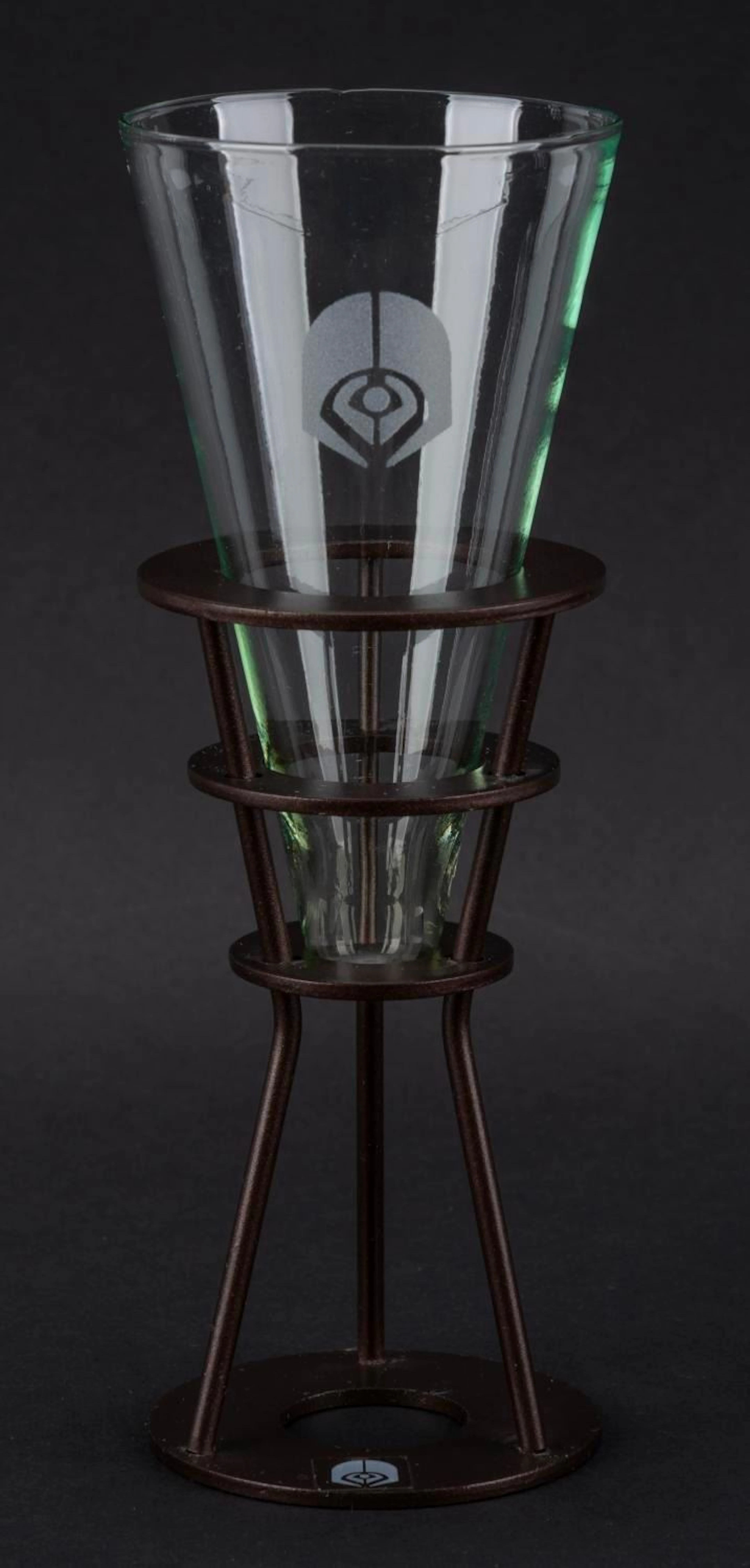 A Quark's Souvenir Shot Glass and Holder.