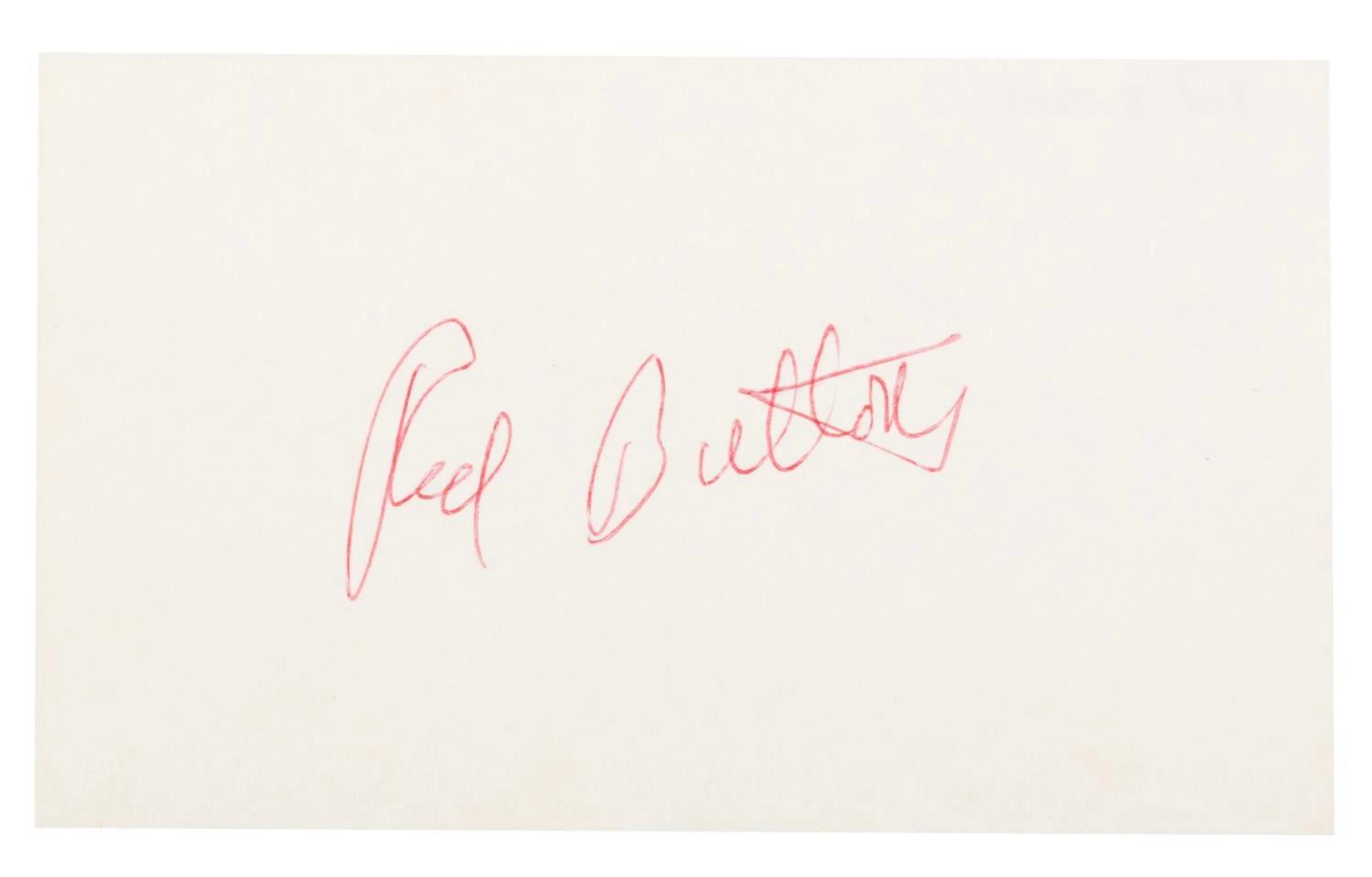 A Red Buttons Signature.