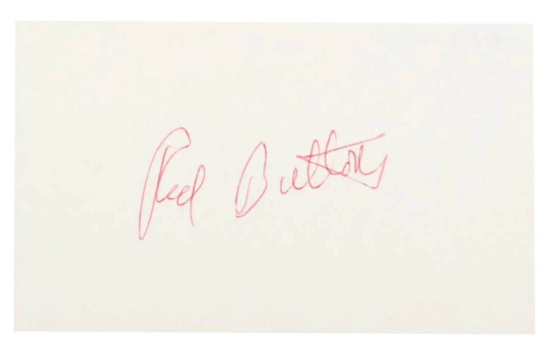 A Red Buttons Signature.