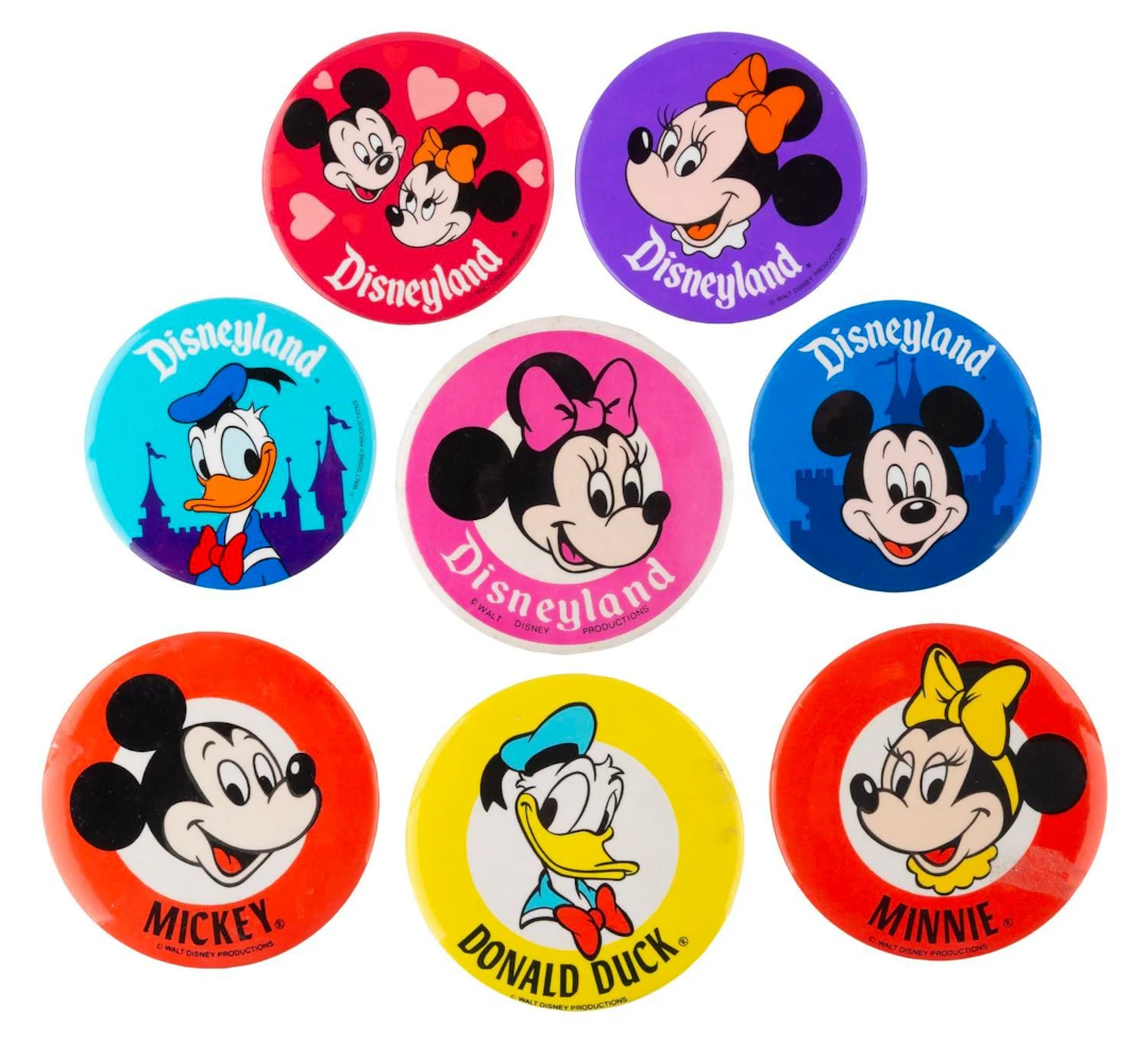 A Collection of Disneyland Character Buttons.