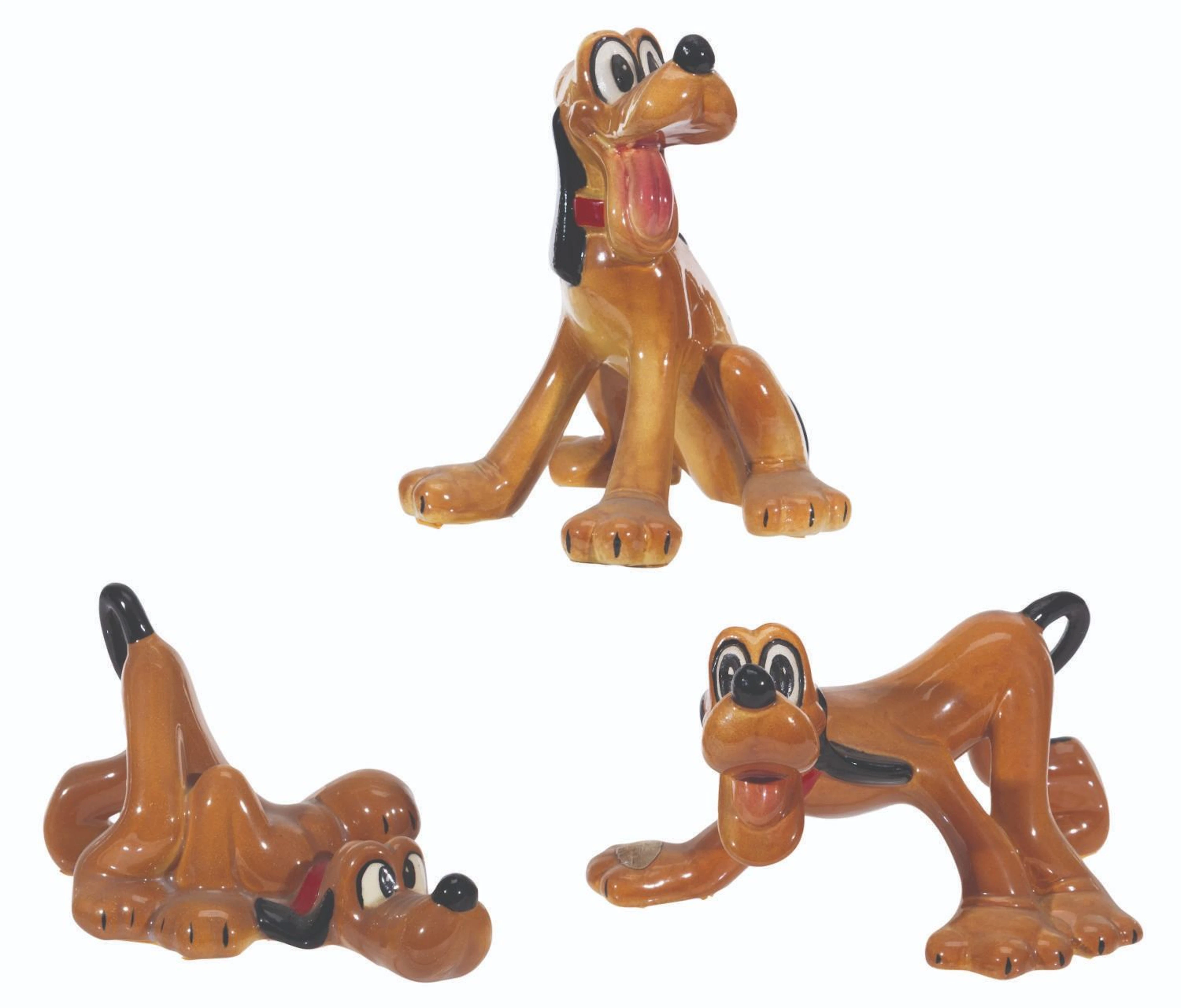 Three Evan K. Shaw Pluto Figurines.