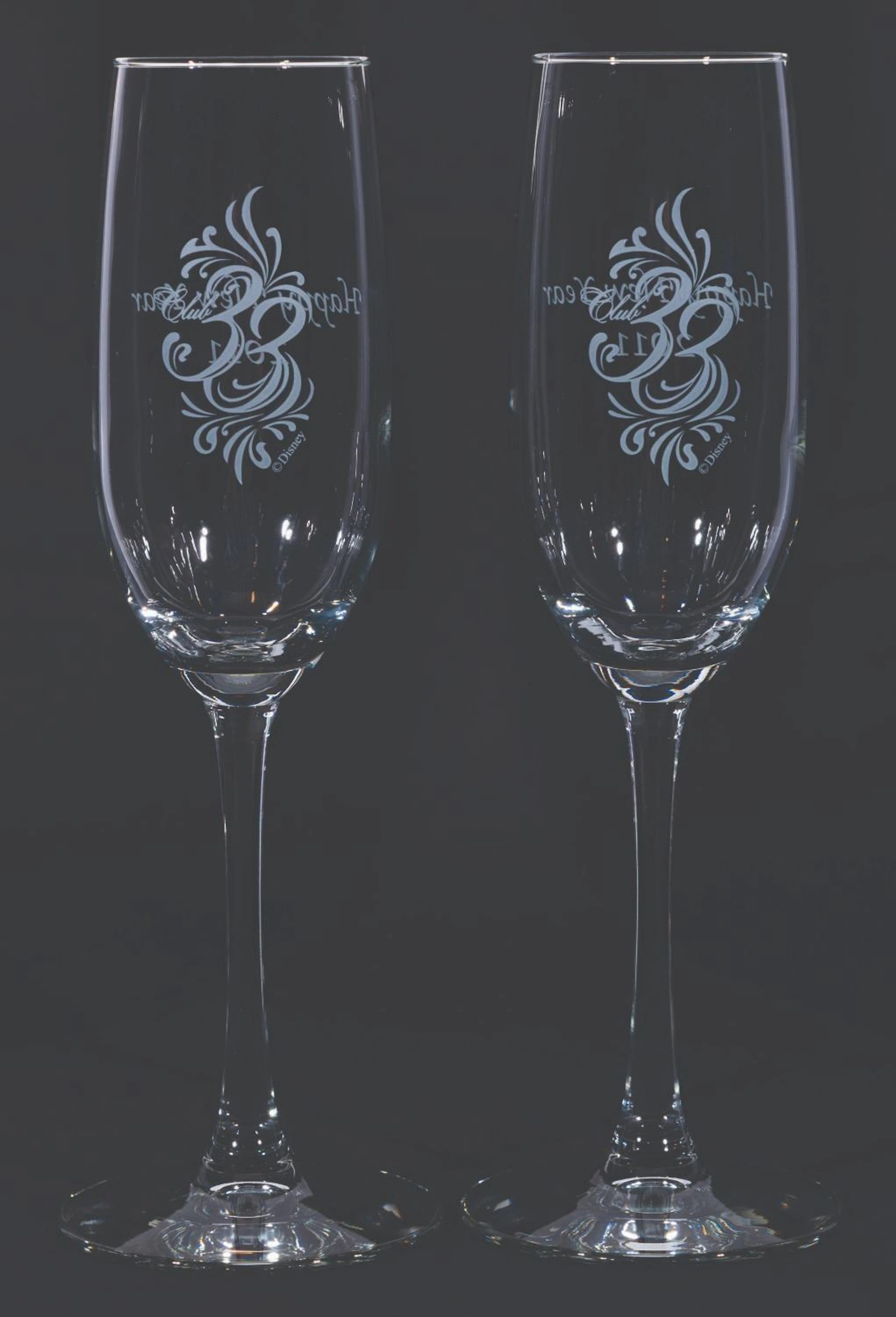 A Pair of Club 33 New Year’s Eve 2011 Champagne Flutes.