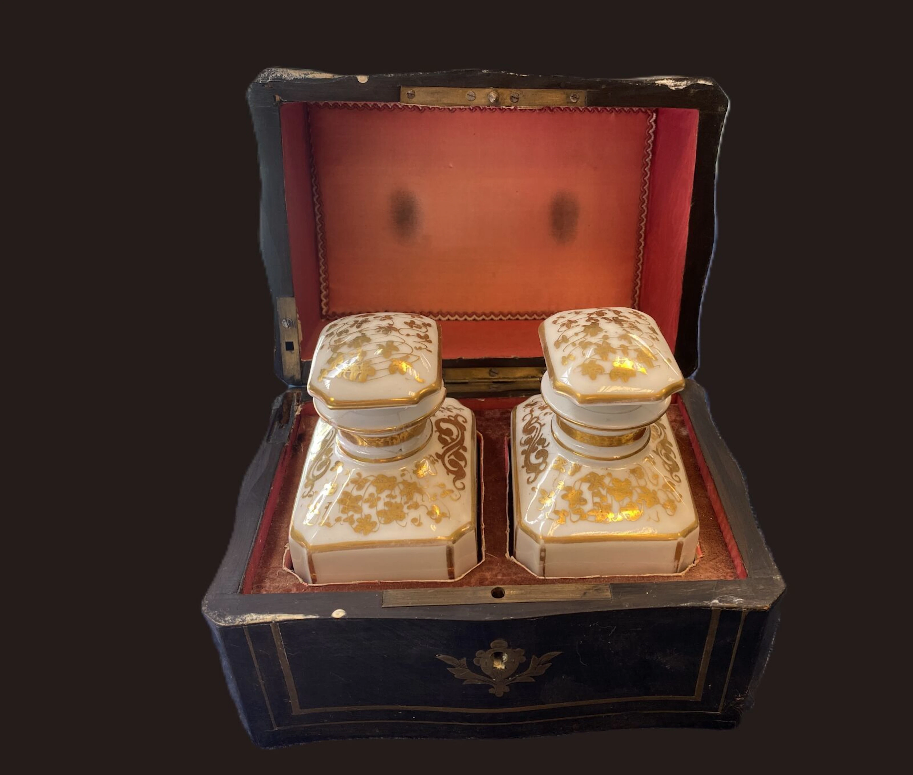 Blackened wood scent box, brass marquetry trim, reveals 2 wh - Lot 107