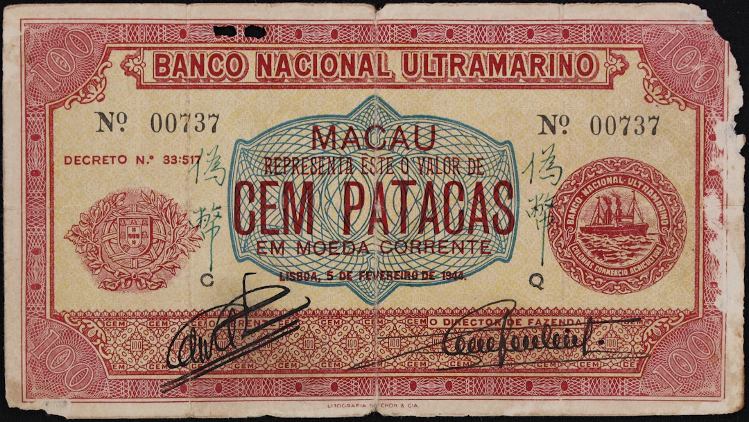 MACAU (SAR). Banco Nacional Ultramarino. 100 Patacas, 5.2.1944. P-26x.