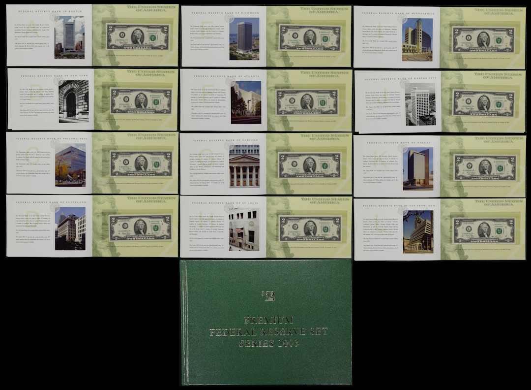 Book of (12) Fr. 1937-A* to 1937-L*. 2003 $2 Federal Reserve Star