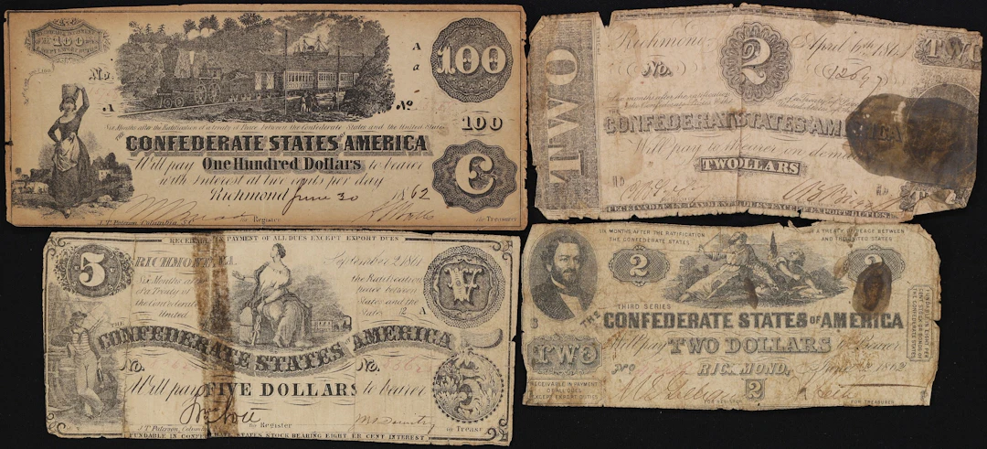 Lot of (4) Confederate Currency. 1861 - 63 $2, $5, & $100. Good to Very Fine.
