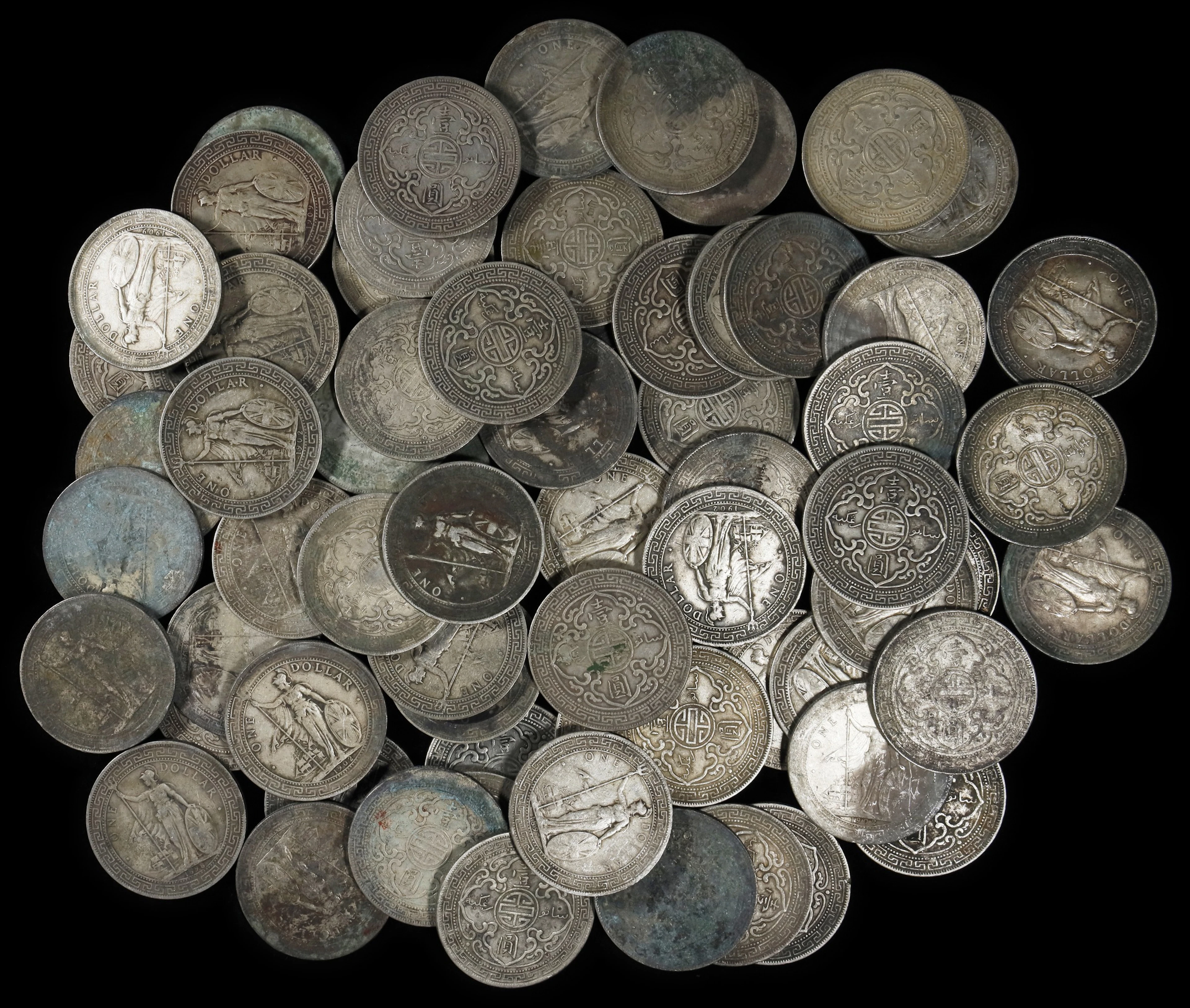 GREAT BRITAIN. Group of Trade Dollars (68 Pieces), 1897-1909. Average