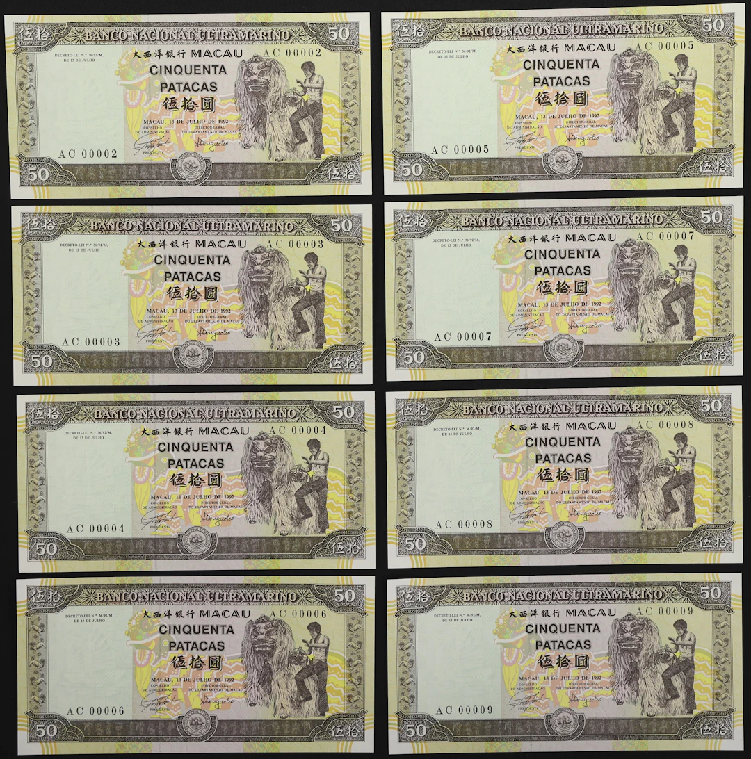 MACAU (SAR). Lot of (8). Banco Nacional Ultramarino. 50 Patacas, 13.7.1992.