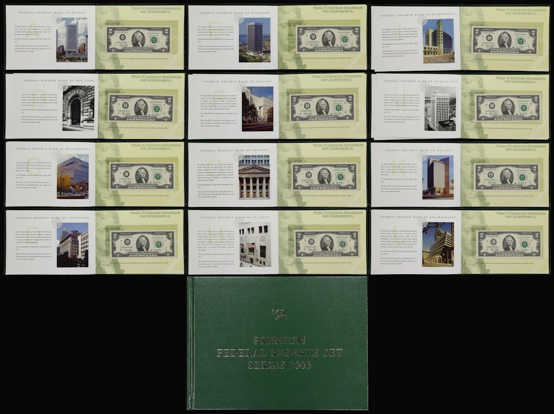 Book of (12) Fr. 1937-A* to 1937-L*. 2003 $2 Federal Reserve Star