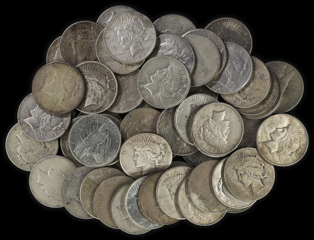 (42.537 oz, 1323.071 g ASW). Lot of (55) Mixed Date Peace Silver Dollars.