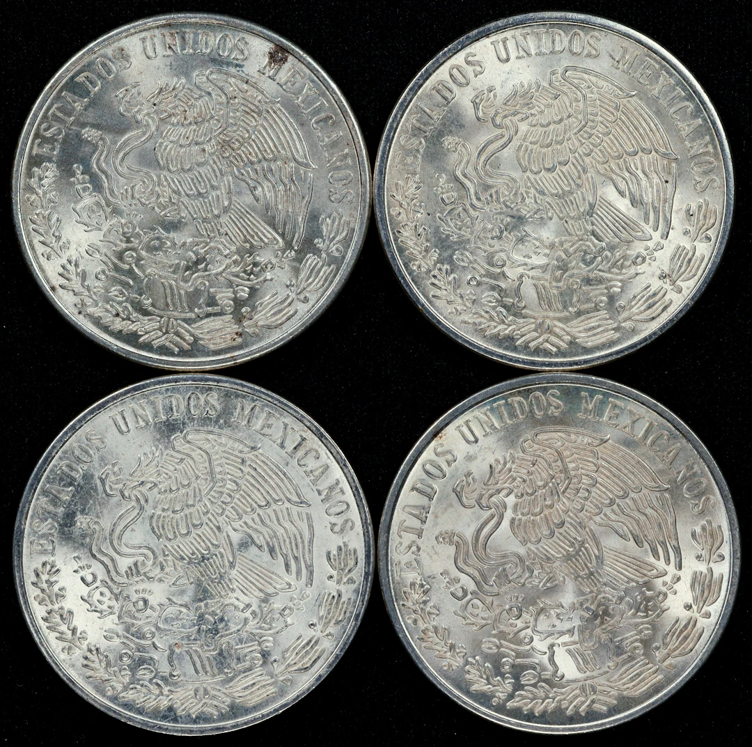 (2.572 oz, 80 g ASW). Mexico. Lot of (4) Mixed Date Silver 100 Pesos.