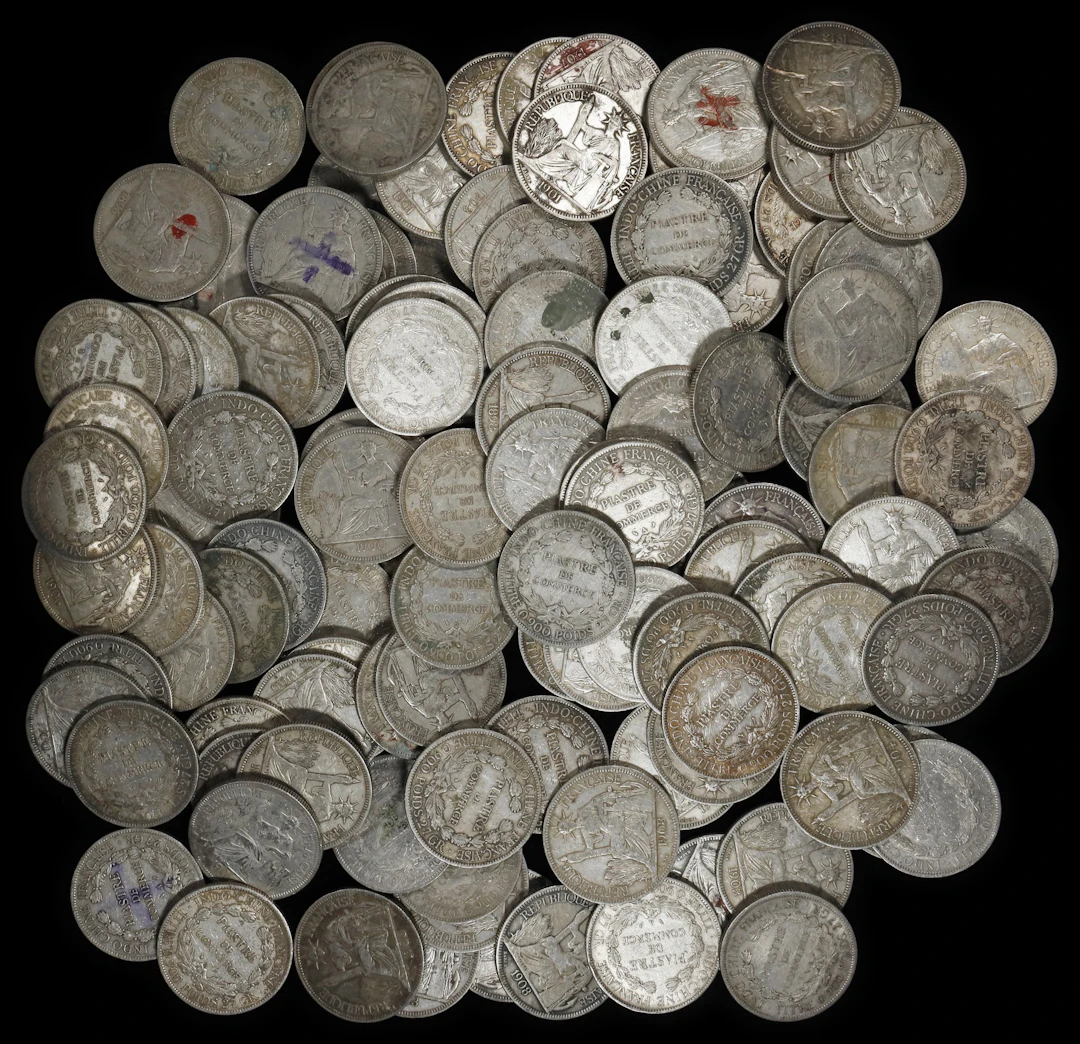 FRENCH INDO-CHINA. Group of Piastres (Approximately 145 Pieces), 1895-1928.