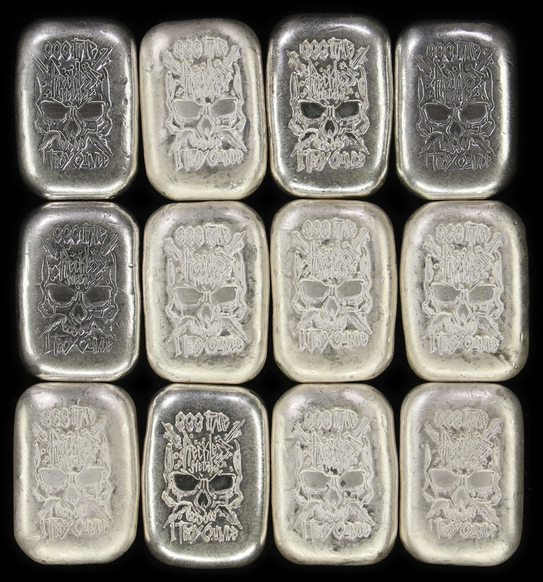 (12 oz, 373.248 g ASW). Lot of (12) Reckless Metals 1 oz Silver Bars.