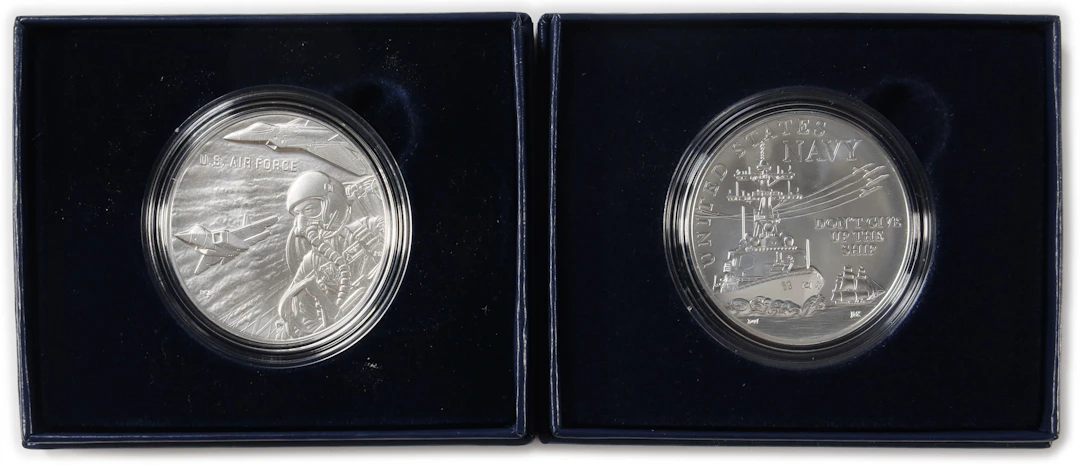 (2 oz, 62.208 g ASW). Lot of (2) Assorted Design U.S. Mint Armed Forces