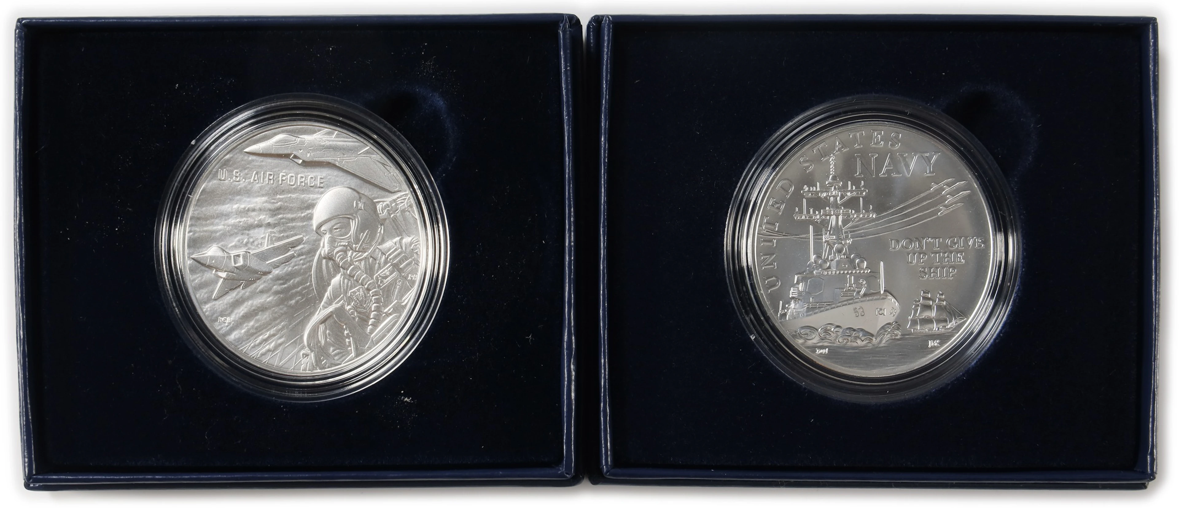 (2 oz, 62.208 g ASW). Lot of (2) Assorted Design U.S. Mint Armed Forces