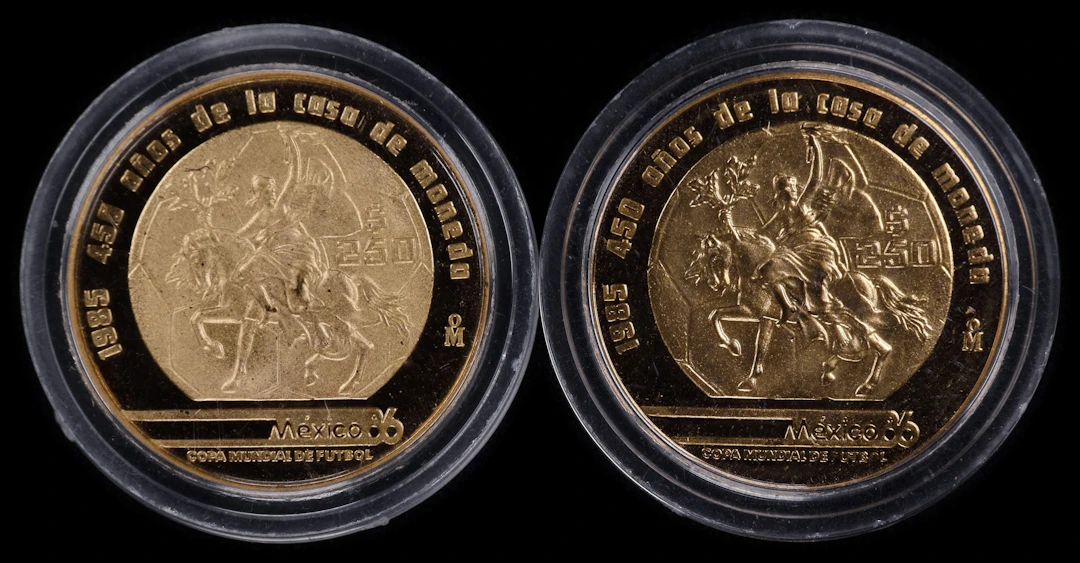 (0.5 oz, 15.552 g AGW). Mexico. Lot of (2) 1985 World Cup Gold 250 Pesos.