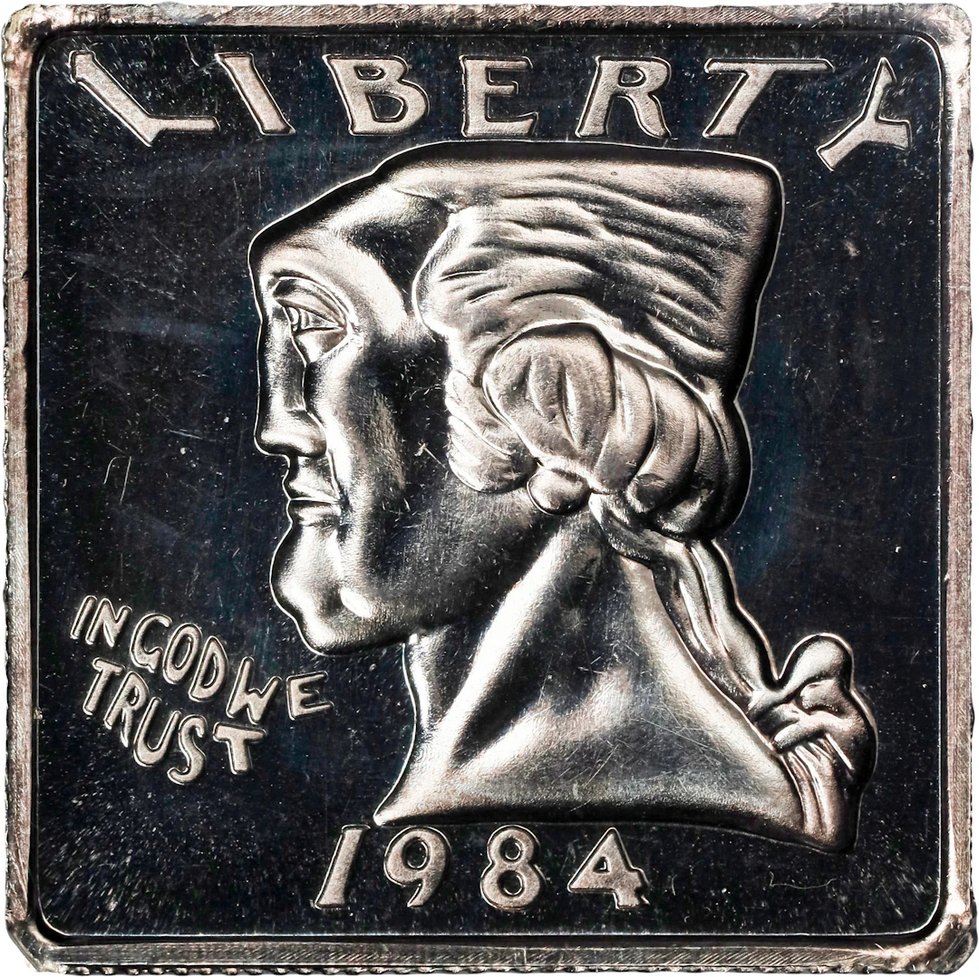1984 Squared Quarter. By Andor Orand, Struck by Medallic Art Company.