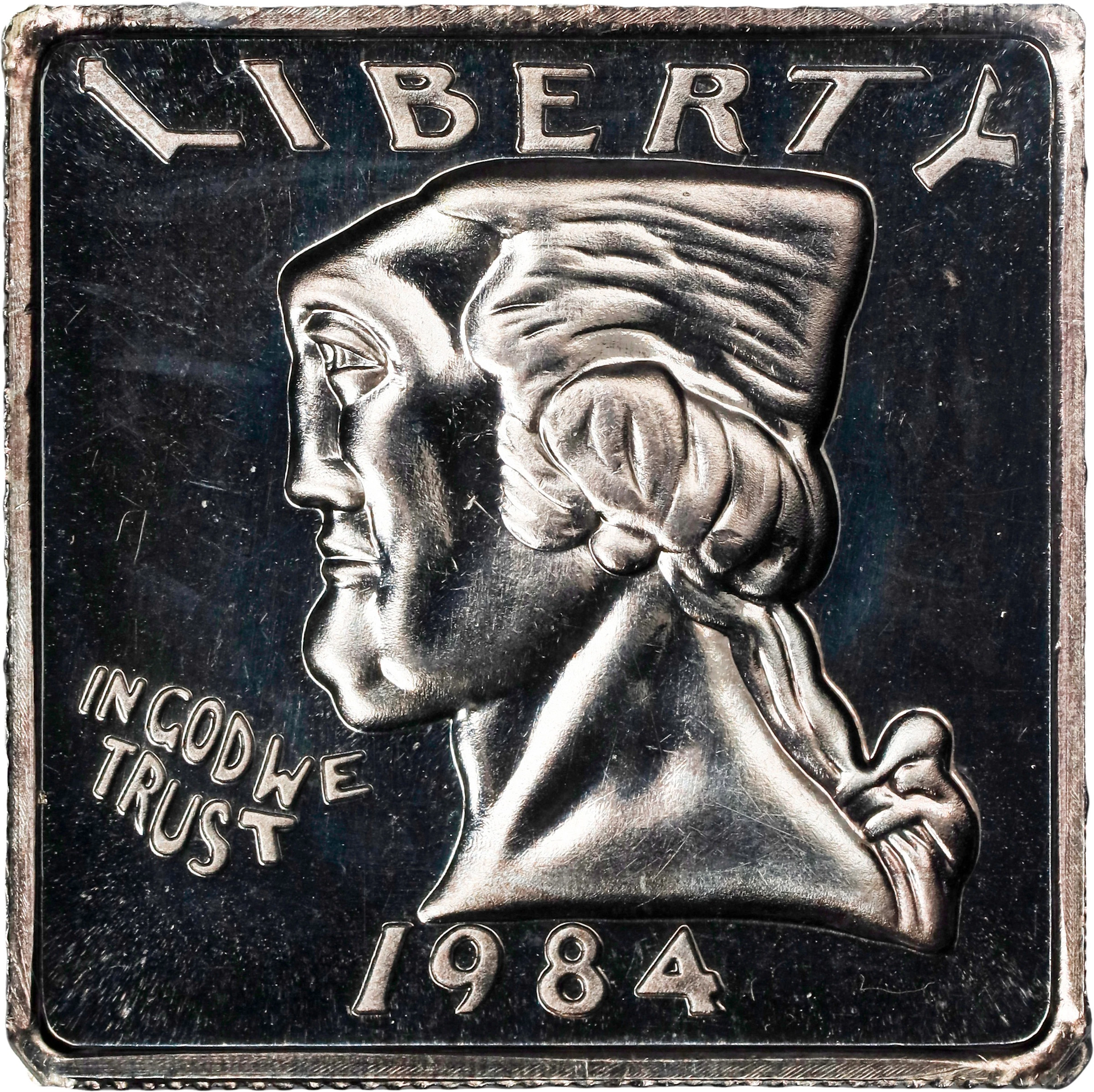 1984 Squared Quarter. By Andor Orand, Struck by Medallic Art Company.