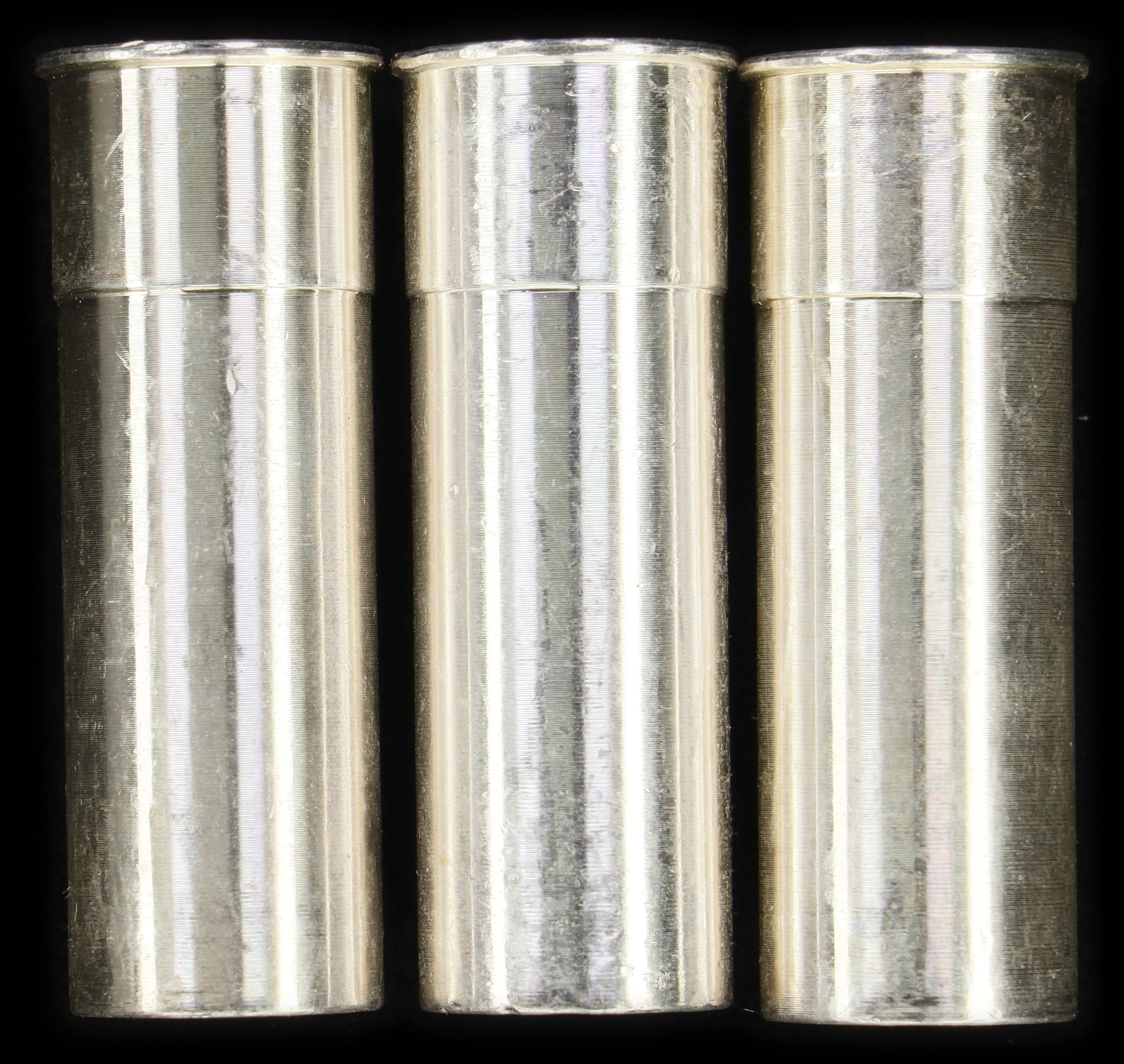 (15 oz, 466.56 g ASW). Lot of (3) Shotgun Shell 5 oz Silver Bullet Replicas.