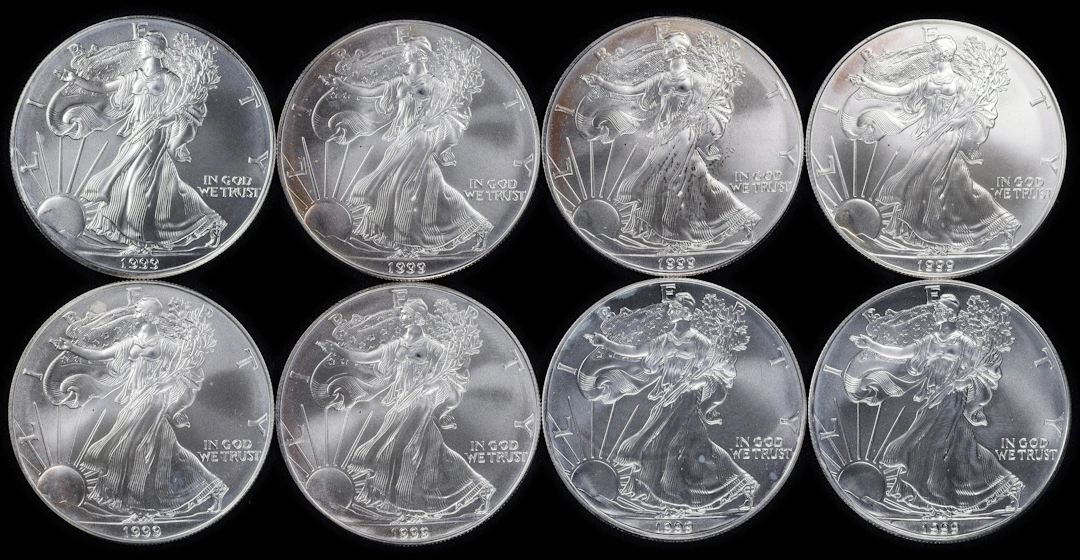 (8 oz, 248.832 g ASW). Lot of (8) 1999 American Silver Eagles.
