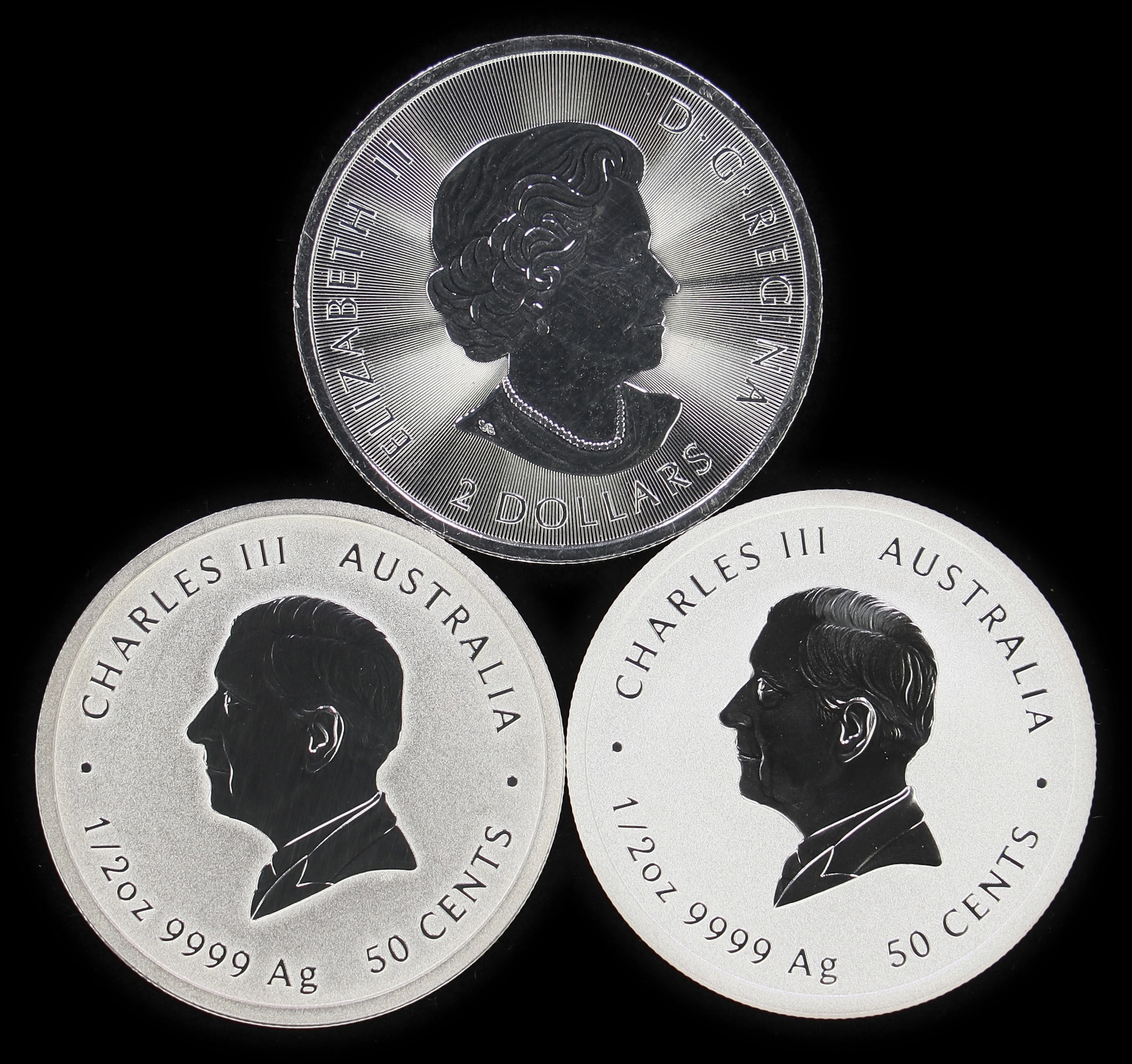 (1.5 oz, 46.656 g ASW). Mixed World. Lot of (3) Mixed Date 1/2 oz Silver Coins.