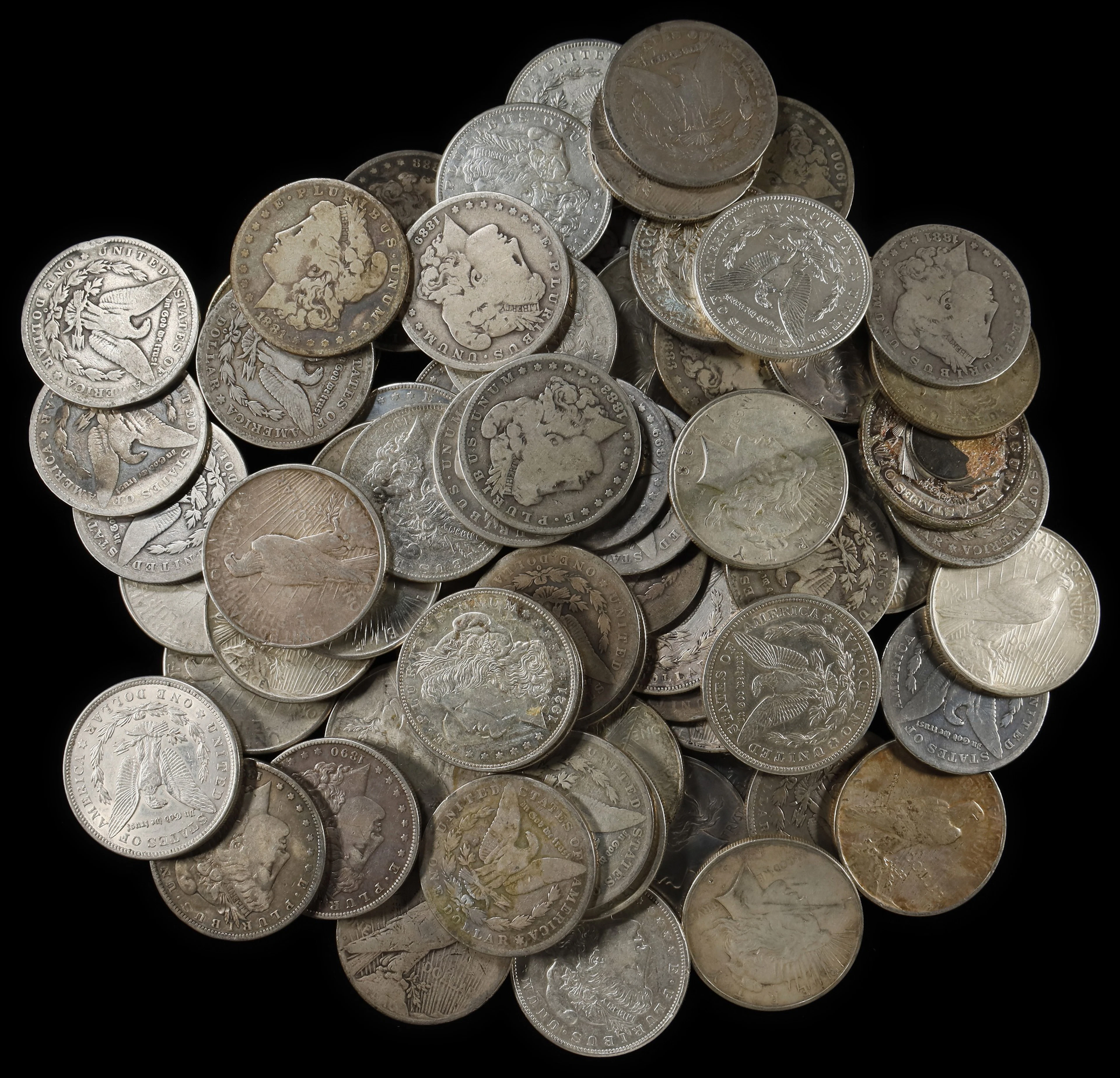 (54.138 oz, 1683.908 g ASW). Lot of (70) Mixed Date Morgan and Peace