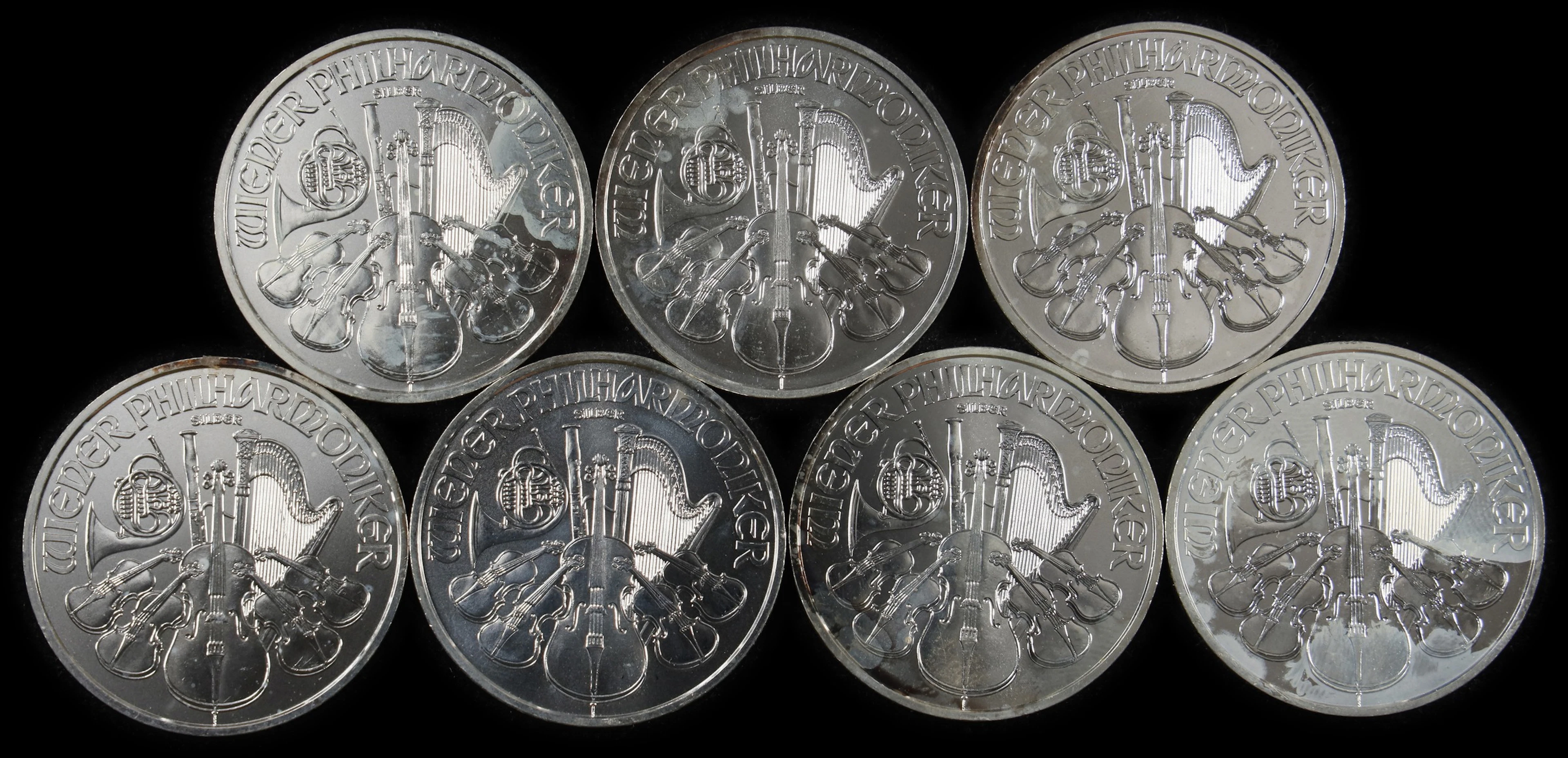 (7 oz, 217.728 g ASW). Austria. Lot of (7) Mixed Date 1 oz Silver