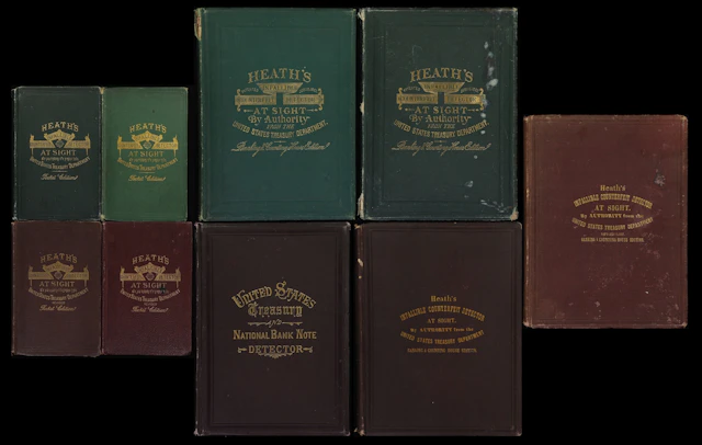 Lot of (9) Heath's Infallible Counterfeit Detector Books. 1860s-70s.