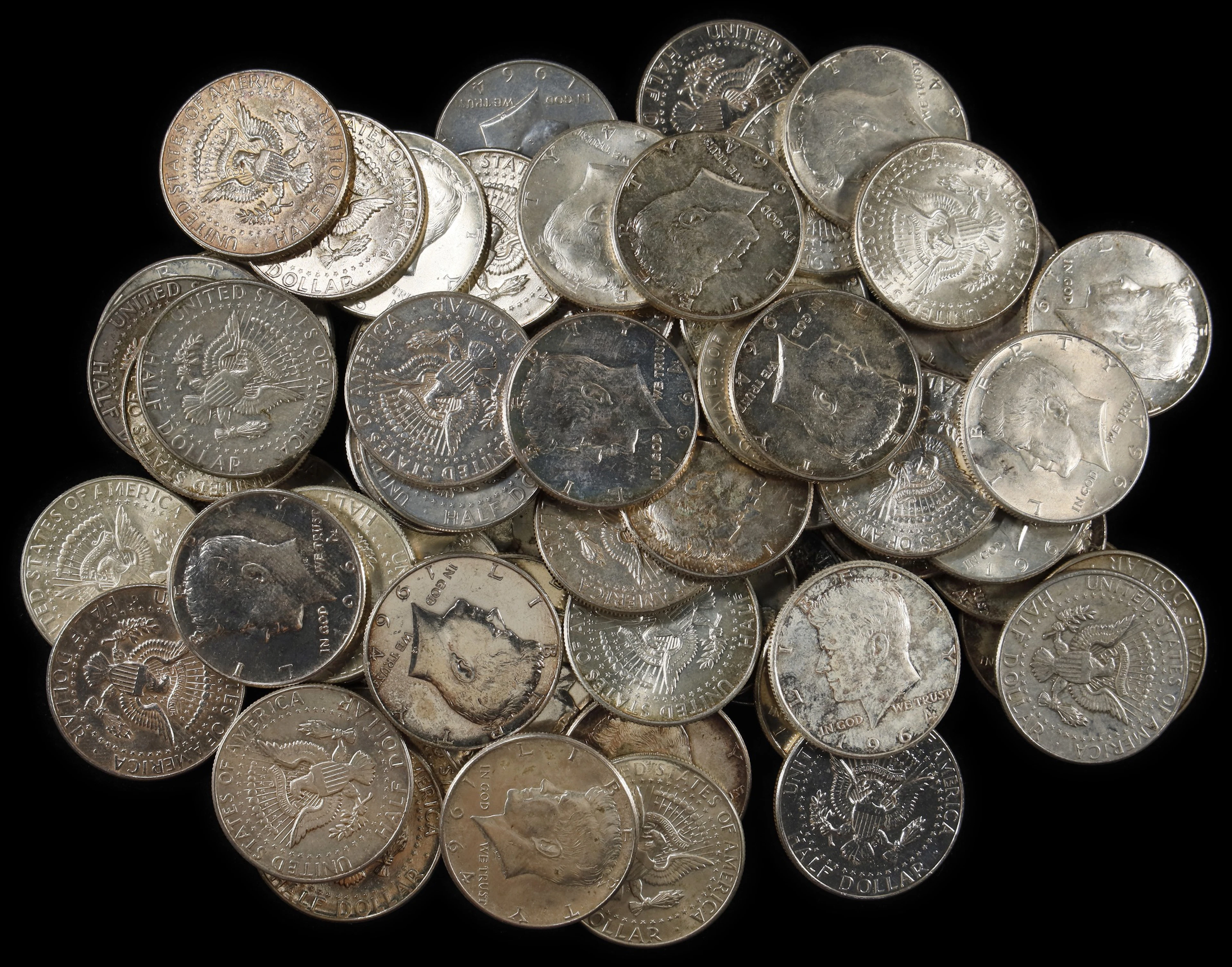 (23.892 oz, 743.137 g ASW). Lot of (66) 1964 Kennedy Silver Half-Dollars.