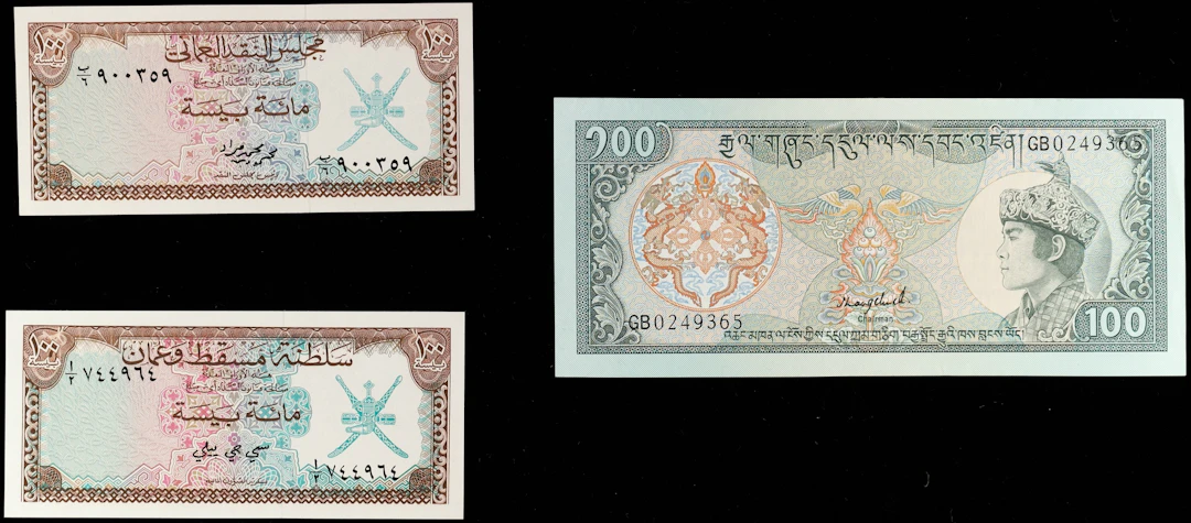 MIXED LOTS. Lot of (3). Bhutan & Oman (Sultanate and Currency Board).