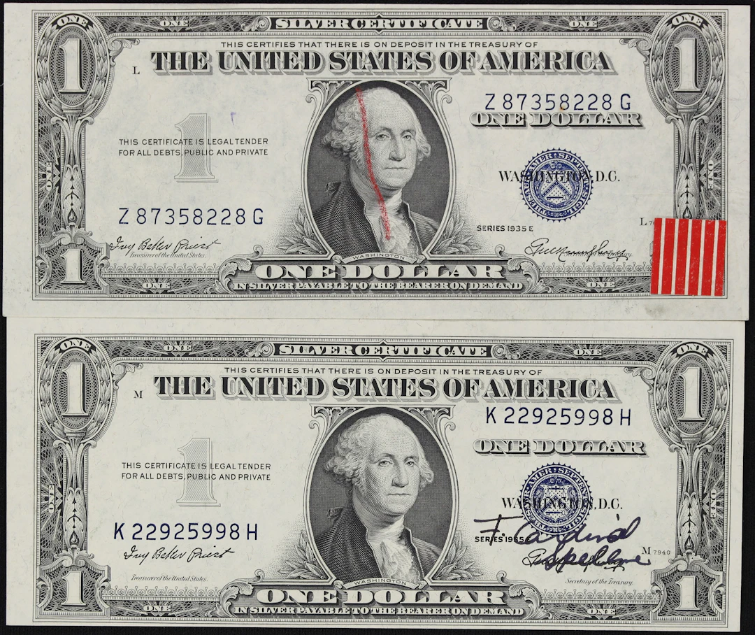 Lot of (2) Fr. 1614. 1935E $1 Silver Certificates. Choice Uncirculated.