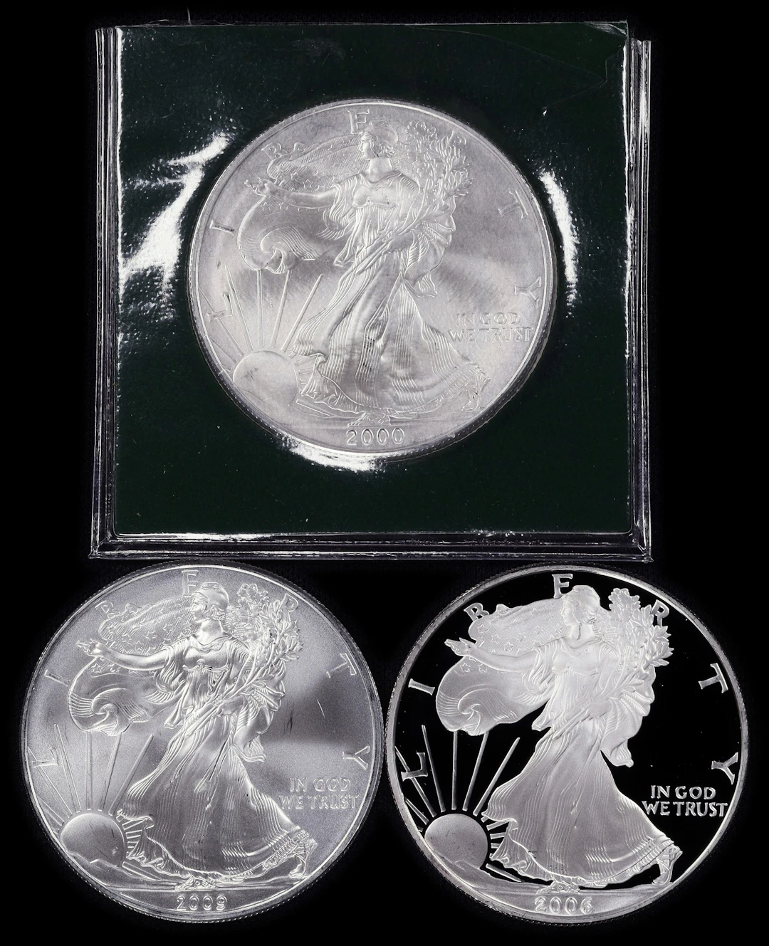 (3 oz, 93.312 g ASW). Lot of (3) Mixed Date American Silver Eagles.