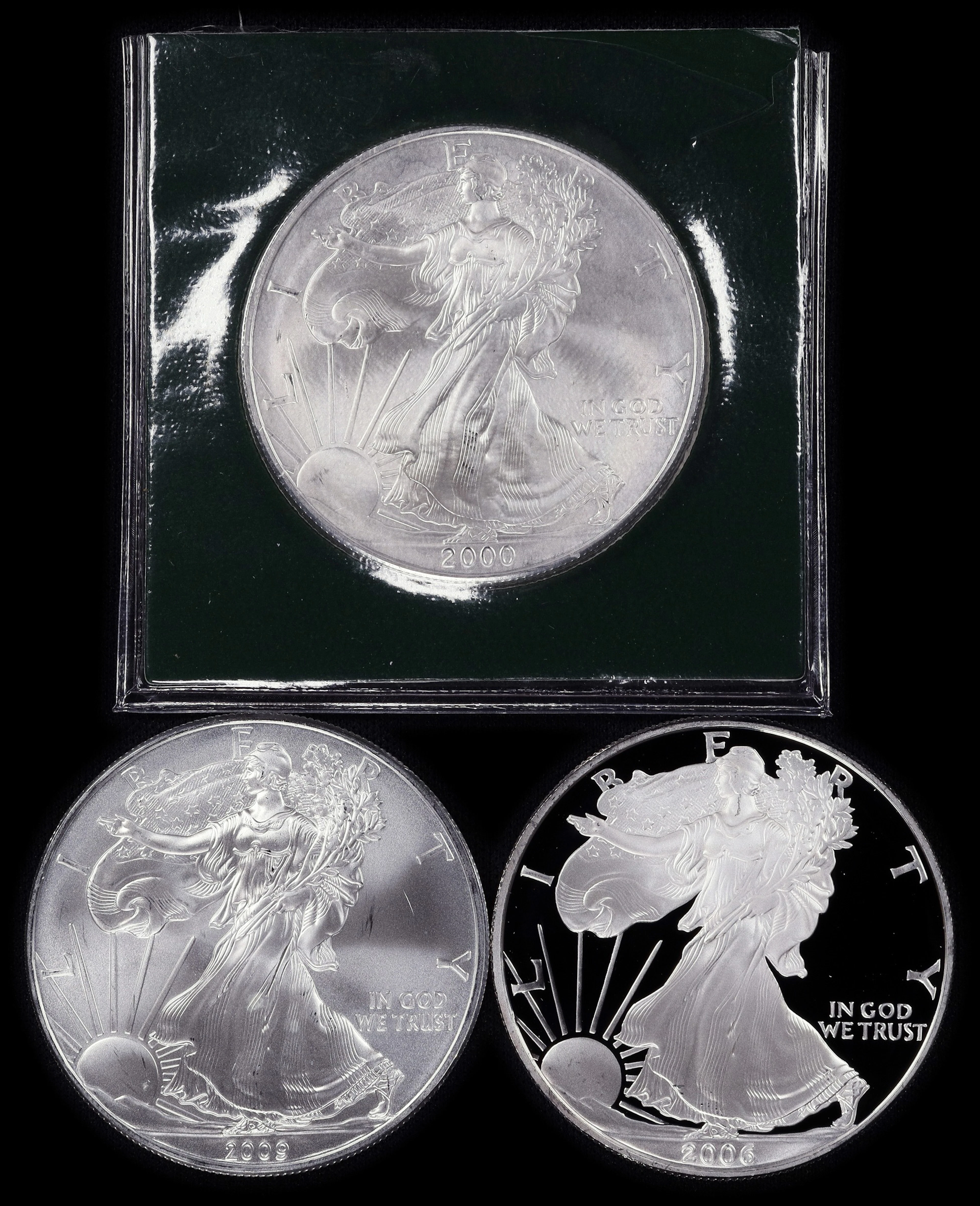 (3 oz, 93.312 g ASW). Lot of (3) Mixed Date American Silver Eagles.