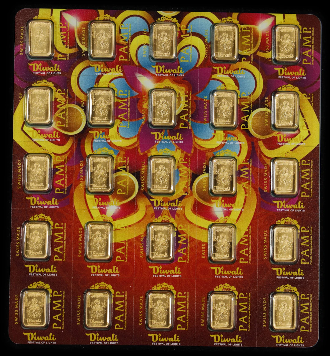 (0.804 oz, 25 g AGW). PAMP Diwali Festival of Lights 25 gram Gold Bar Set.