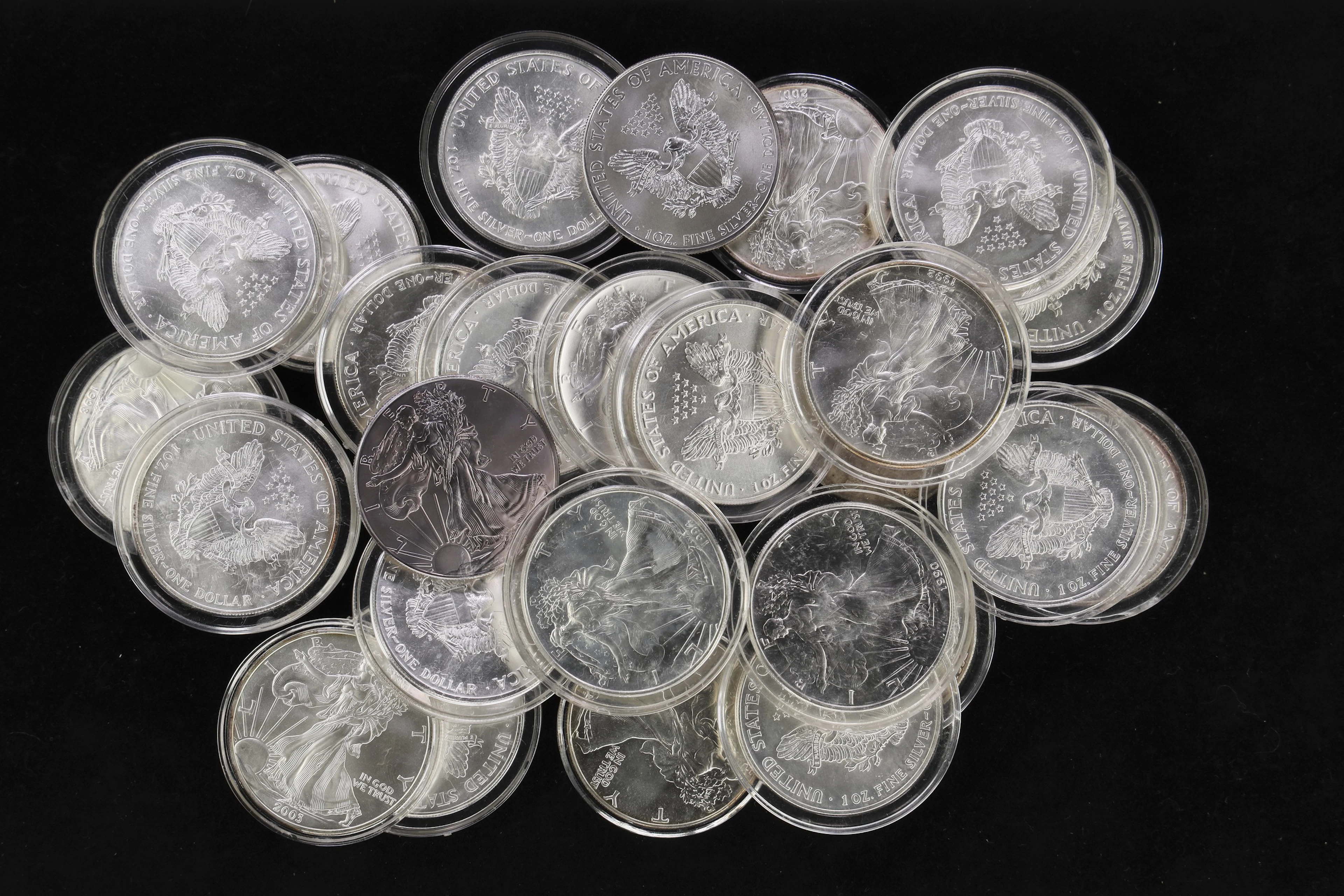 (26 oz, 808.704 g ASW). Lot of (26) Mixed Date American Silver Eagles.