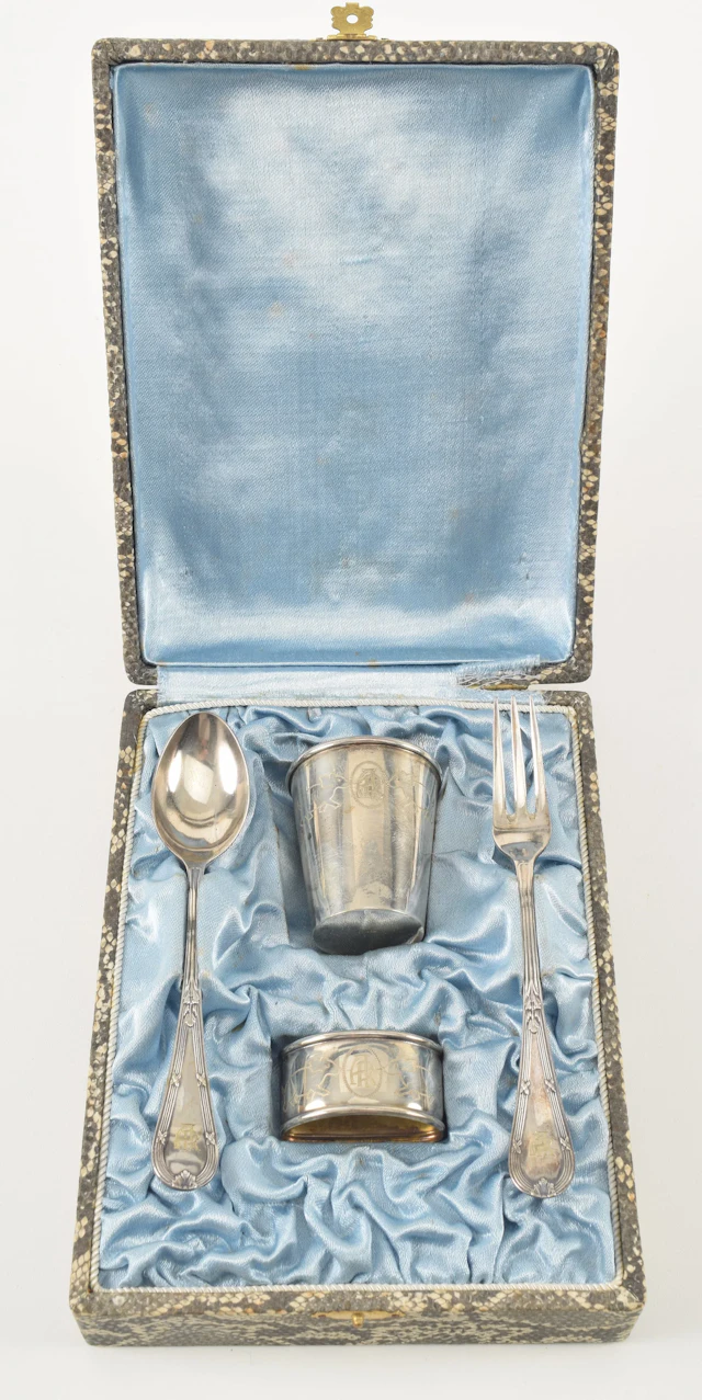 Antique child's set with silver cup and napkin ring. Engraved animal