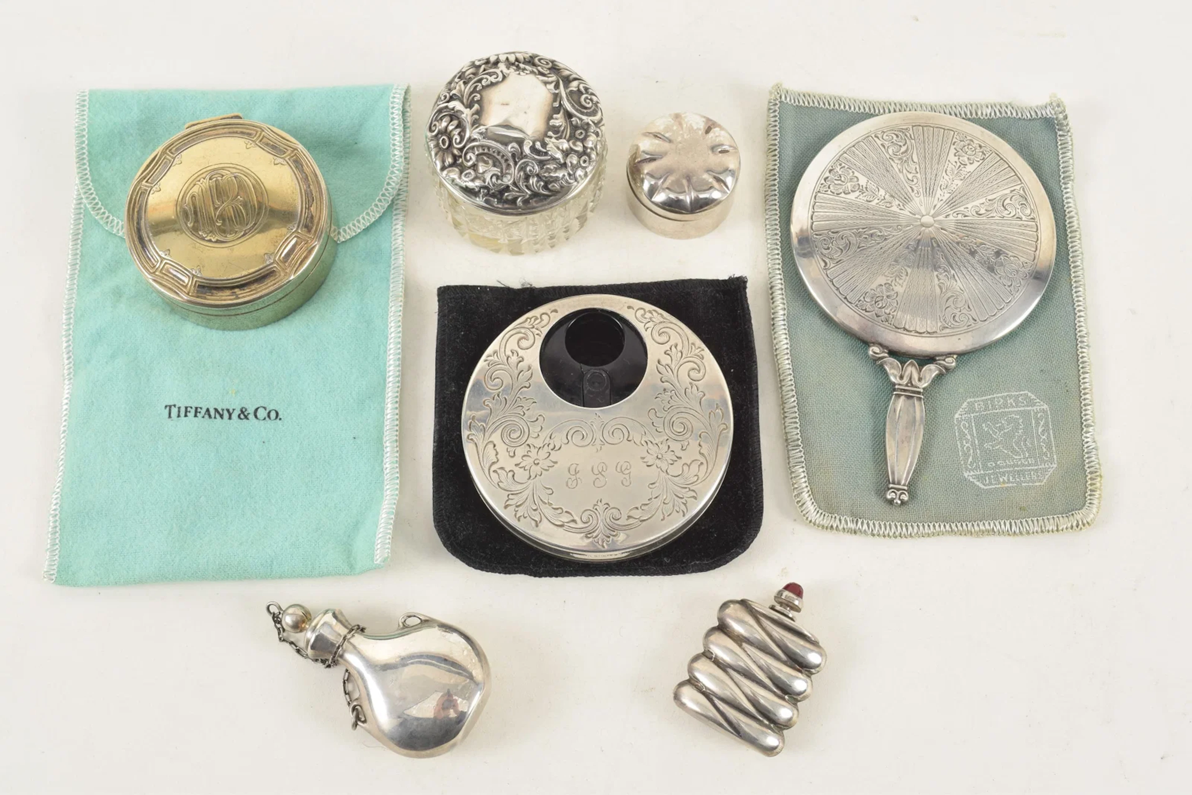 Collection of sterling items, including 4 snuff related items, a Tiffany