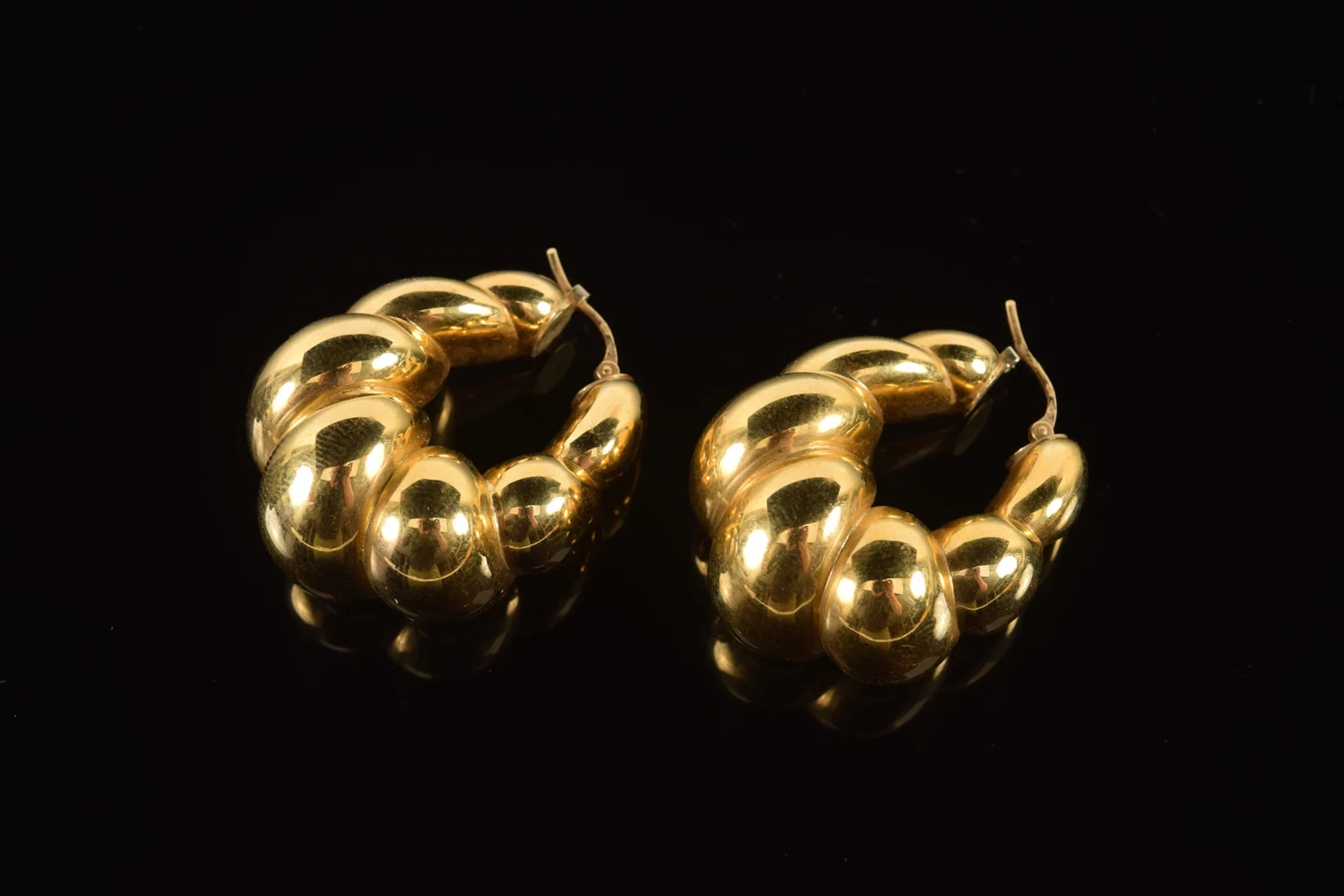 18K gold twisted crescent form earrings. Fleur de Lys and other hallmark