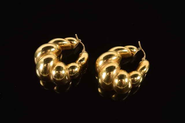 18K gold twisted crescent form earrings. Fleur de Lys and other hallmark