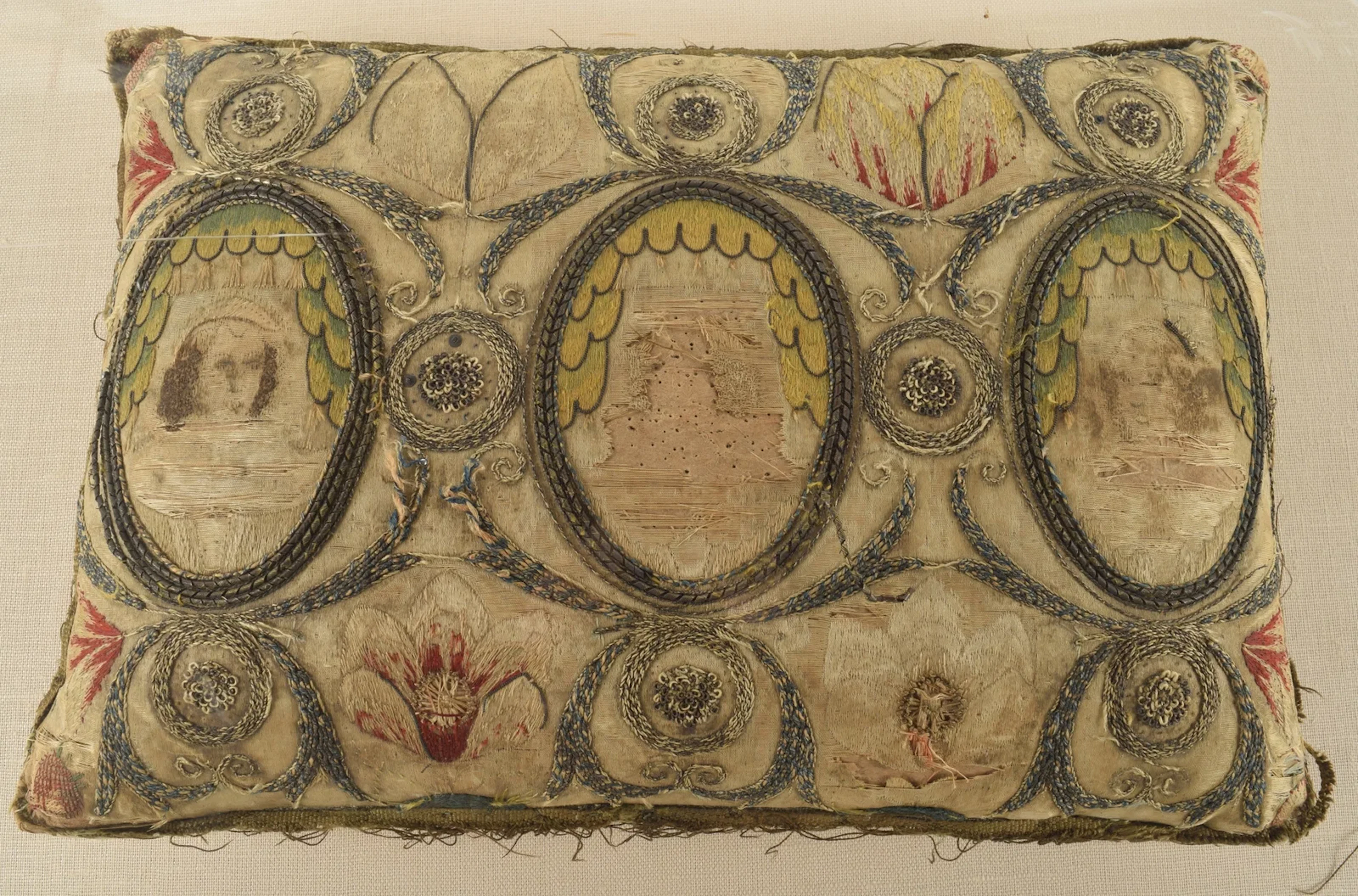 A rare English 17th or 18th Century embroidered and needlework cushion