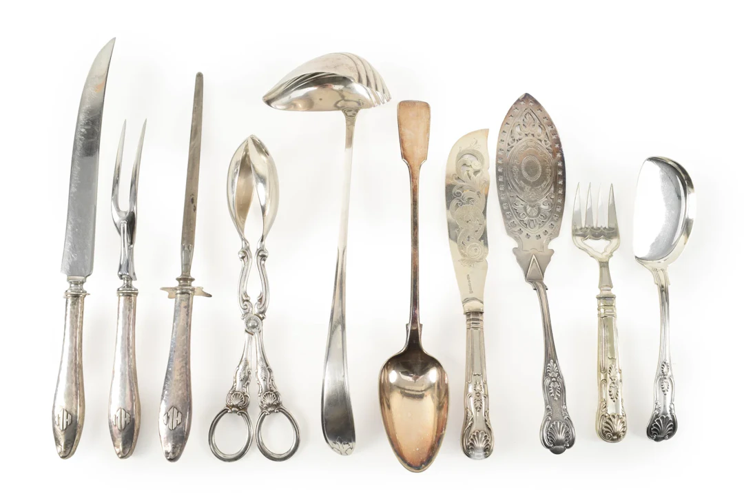10 Silver serving items, mostly plated some hollow handled sterling