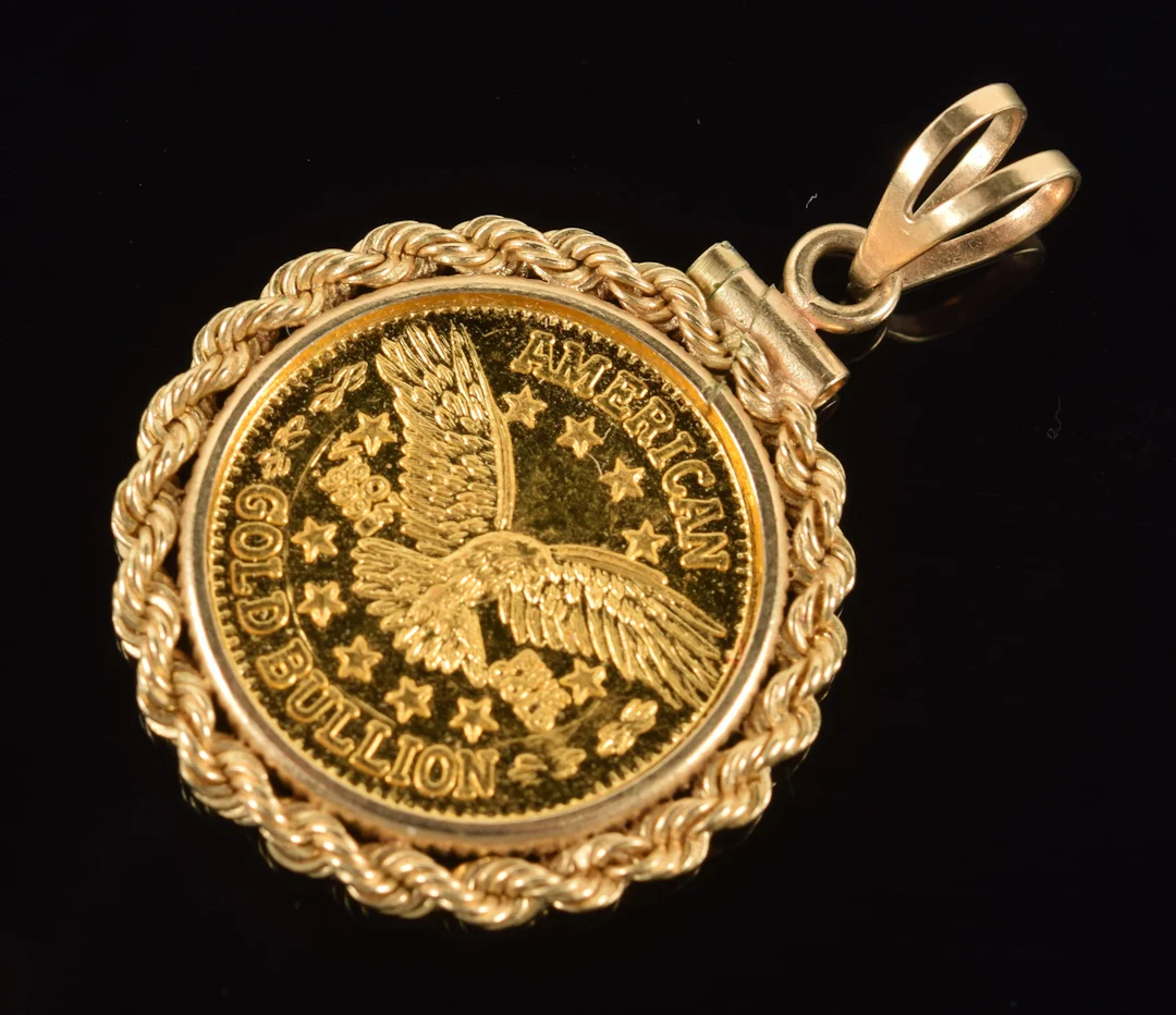 1/10 oz fine gold bullion coin, mounted as a pendant. Mounts marked