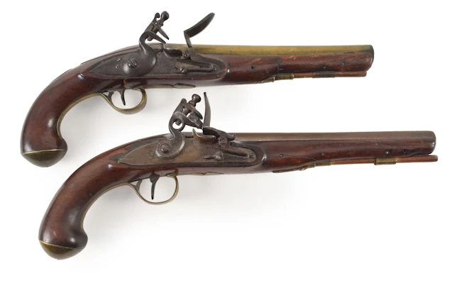 2 early 19th century English flintlock pistols. To include: 1) Ketland