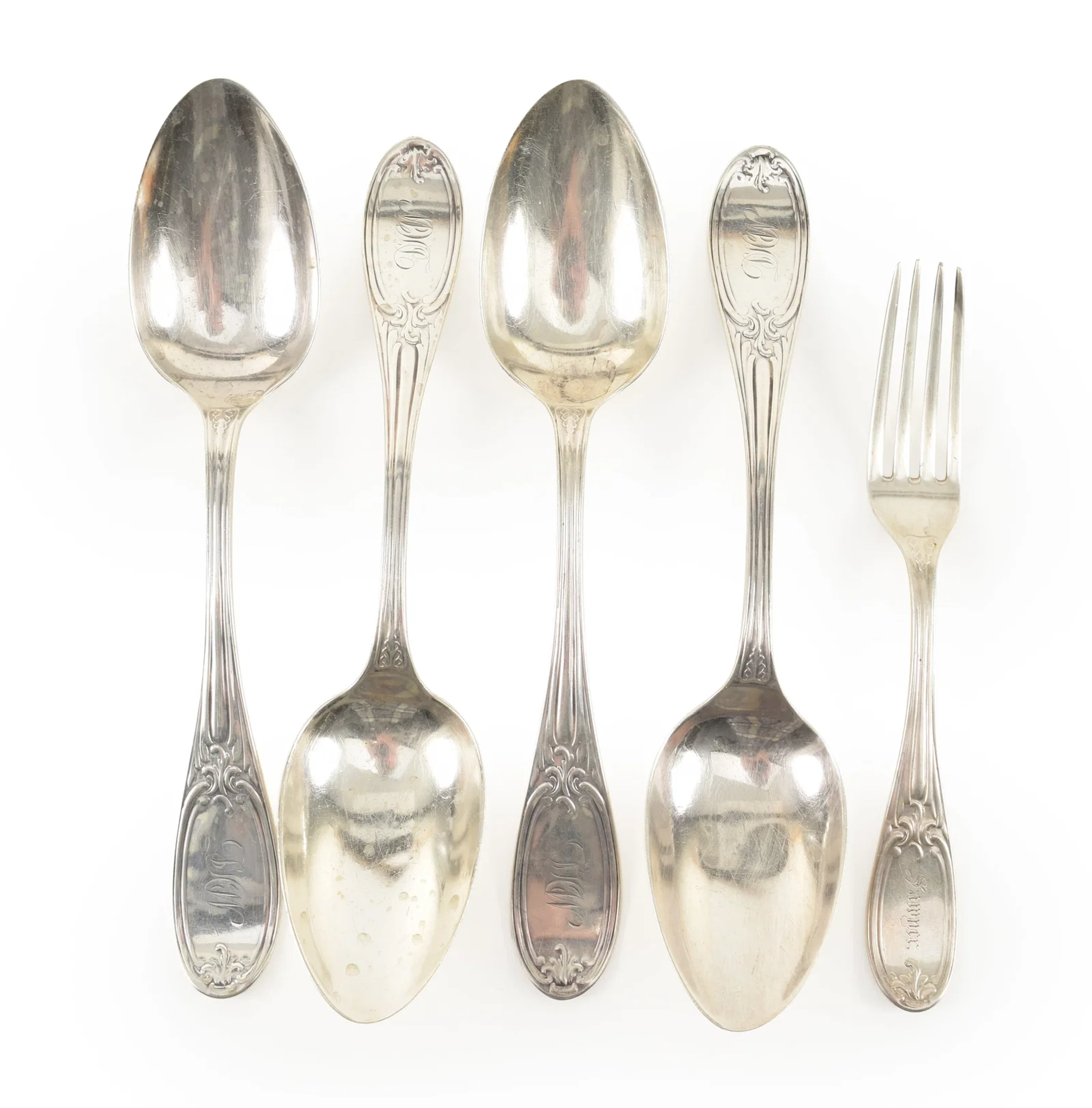 5 Pieces of 19th Century American silver flatware including 4 tablespoons